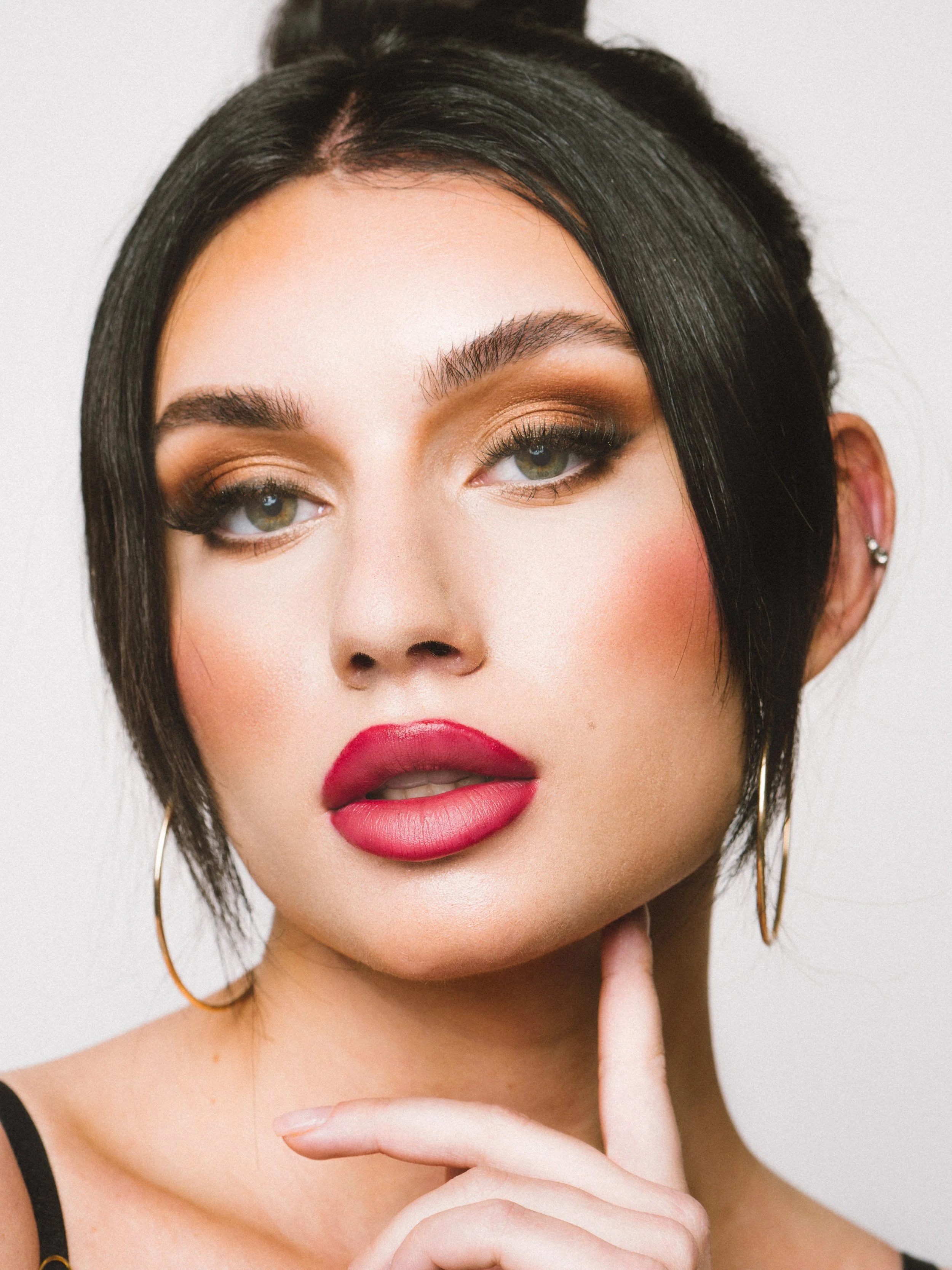 Glam eyeshadow with soft focus skin and defined lips. Beauty by Kinga for commercial and beauty imagery