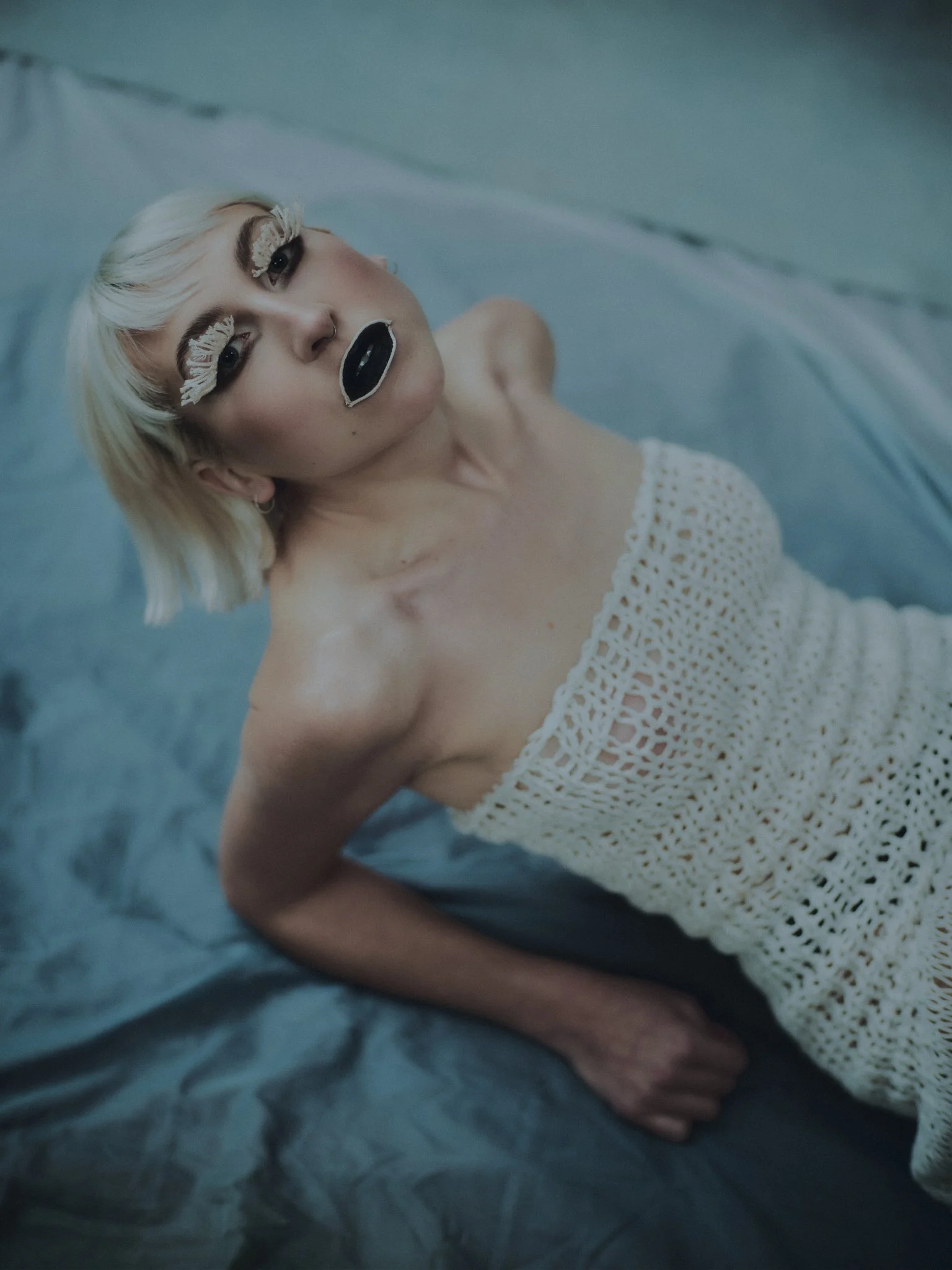 Bold black‑lip editorial. Striking monochrome beauty featuring deep black lips and sculpted skin. Created by Kinga for fashion‑forward editorial work