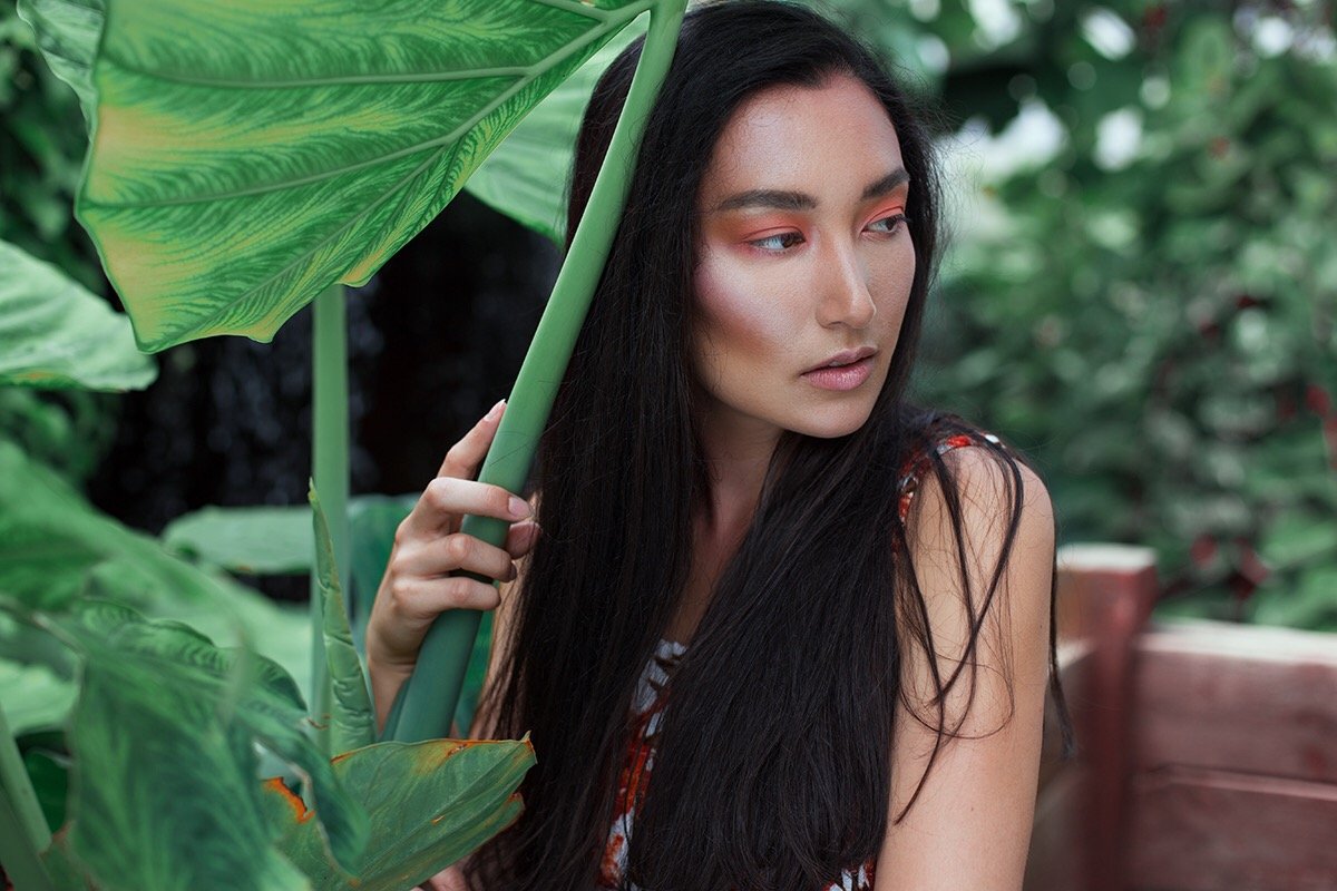 Fresh, glowing complexion with natural textures and botanical styling. Editorial beauty by Kinga, celebrating inclusive, refined artistry.