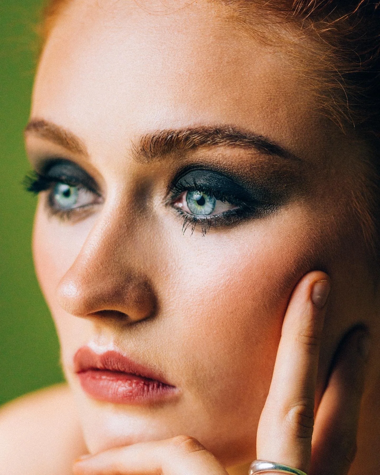 Smokey eye with sculpted features and refined skin work. Editorial beauty by Kinga for commercial and beauty imagery