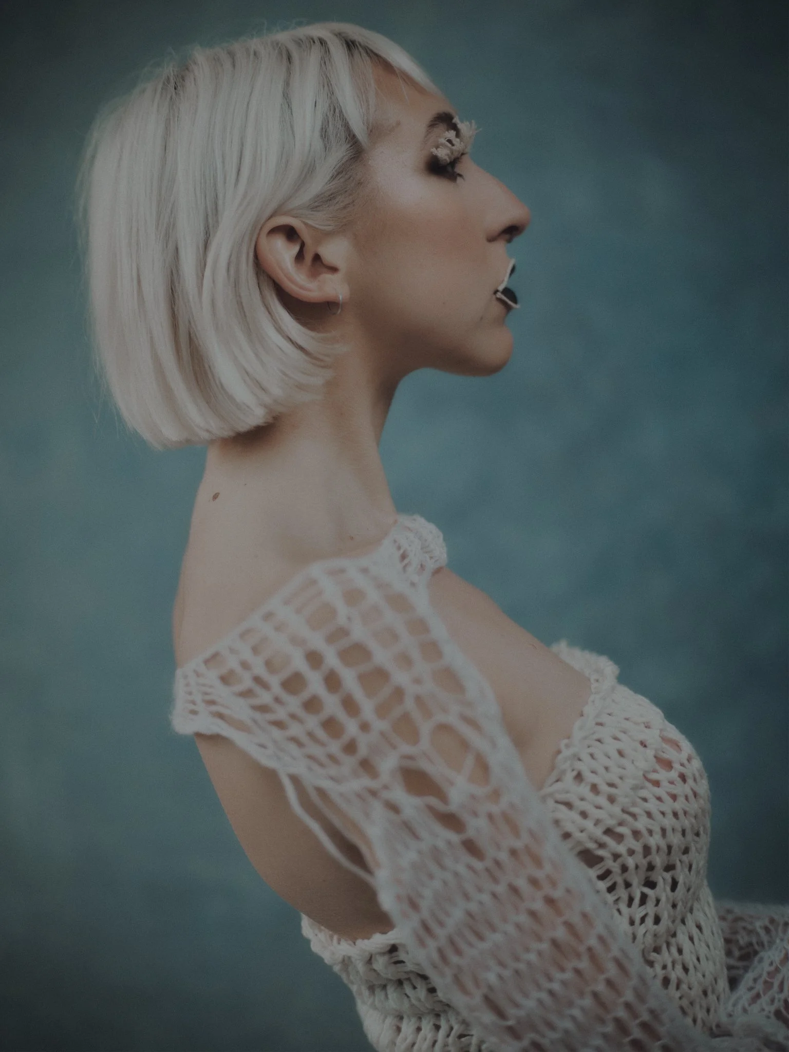 Artistic, textured editorial look paired with handcrafted styling. Makeup by Kinga, blending editorial precision with creative expression, showcasing beautiful highlights 