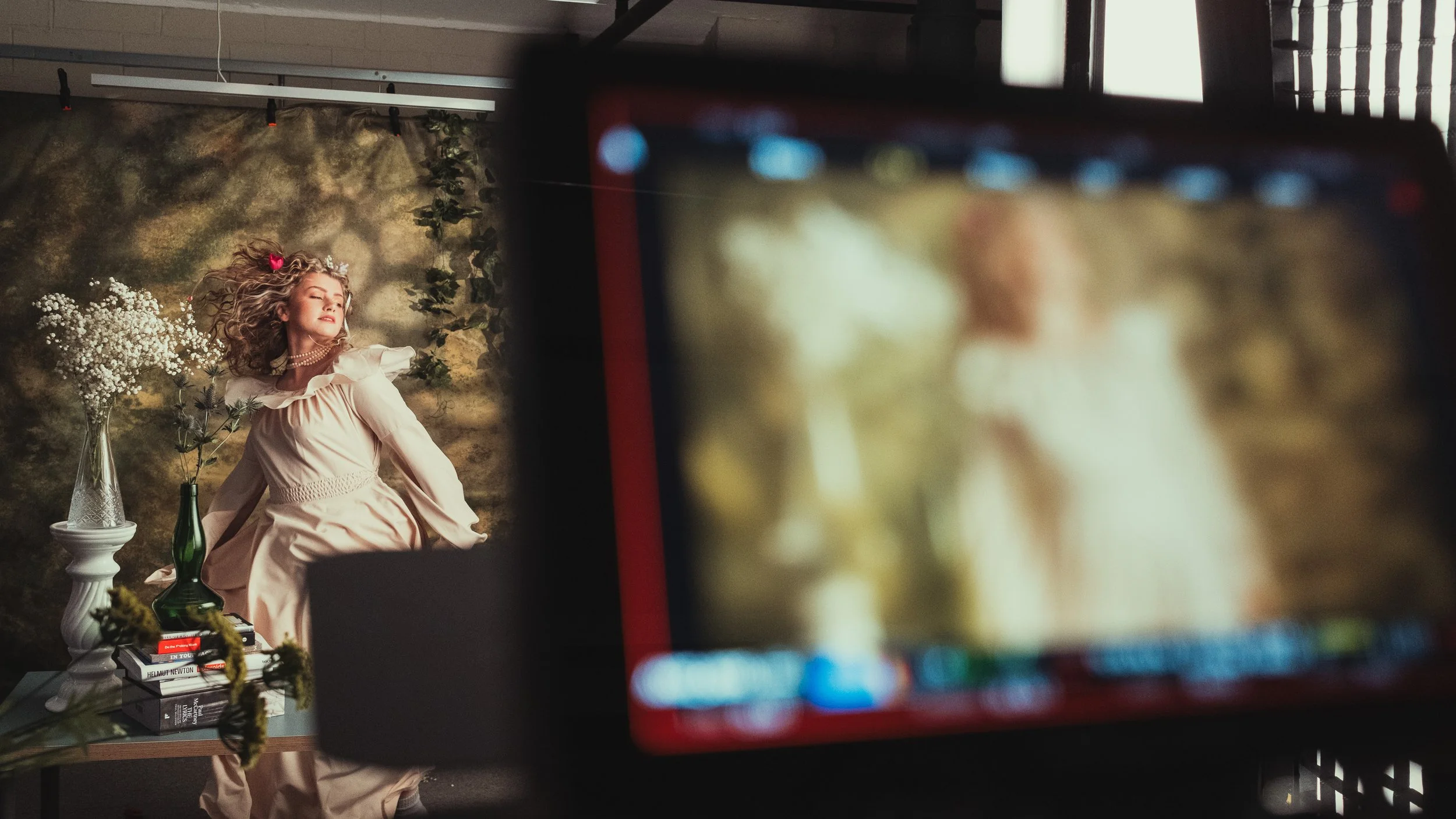 Ellur "Boys" Music Video. BTS Expressive on‑set makeup by Kinga featuring glowing skin and cinematic coloured lighting for music video production.