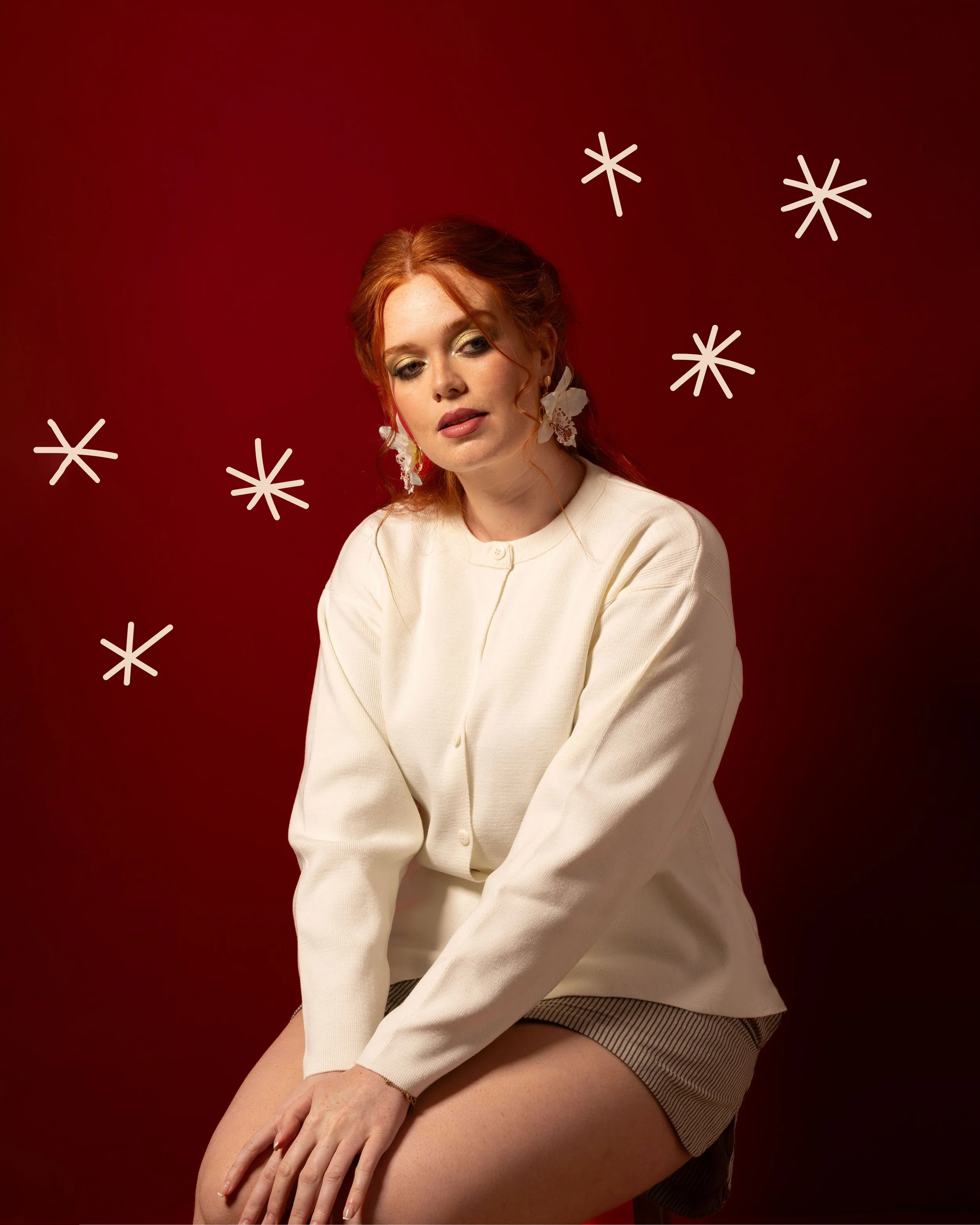 Editorial makeup with warm lighting and sculpted features. Leeds‑based makeup artistry by Kinga.