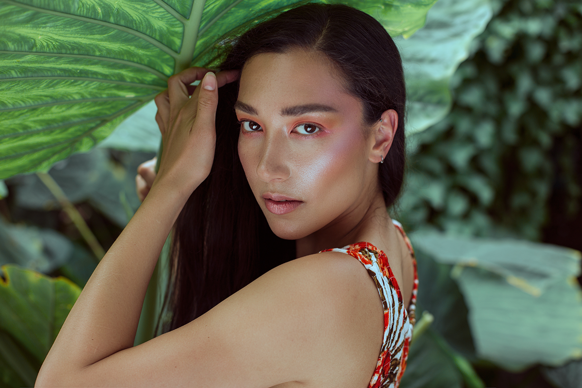 Fresh, glowing complexion with natural textures and botanical styling. Editorial beauty by Kinga, celebrating inclusive, refined artistry.