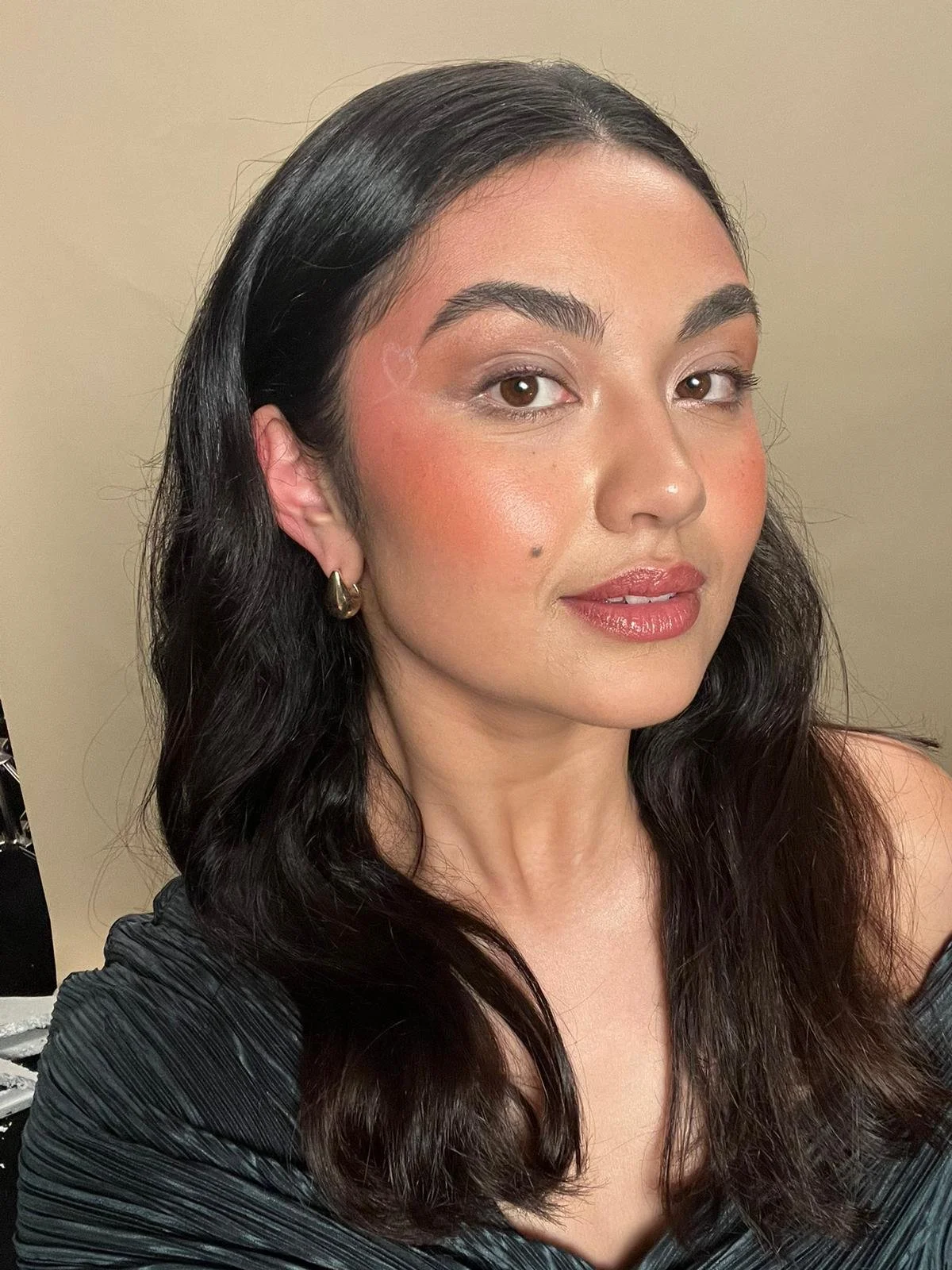 
Glowing, dewy complexion with glossy lips and refined detailing and creative eyeliner. Beauty makeup by Kinga for skincare and cosmetic campaigns.