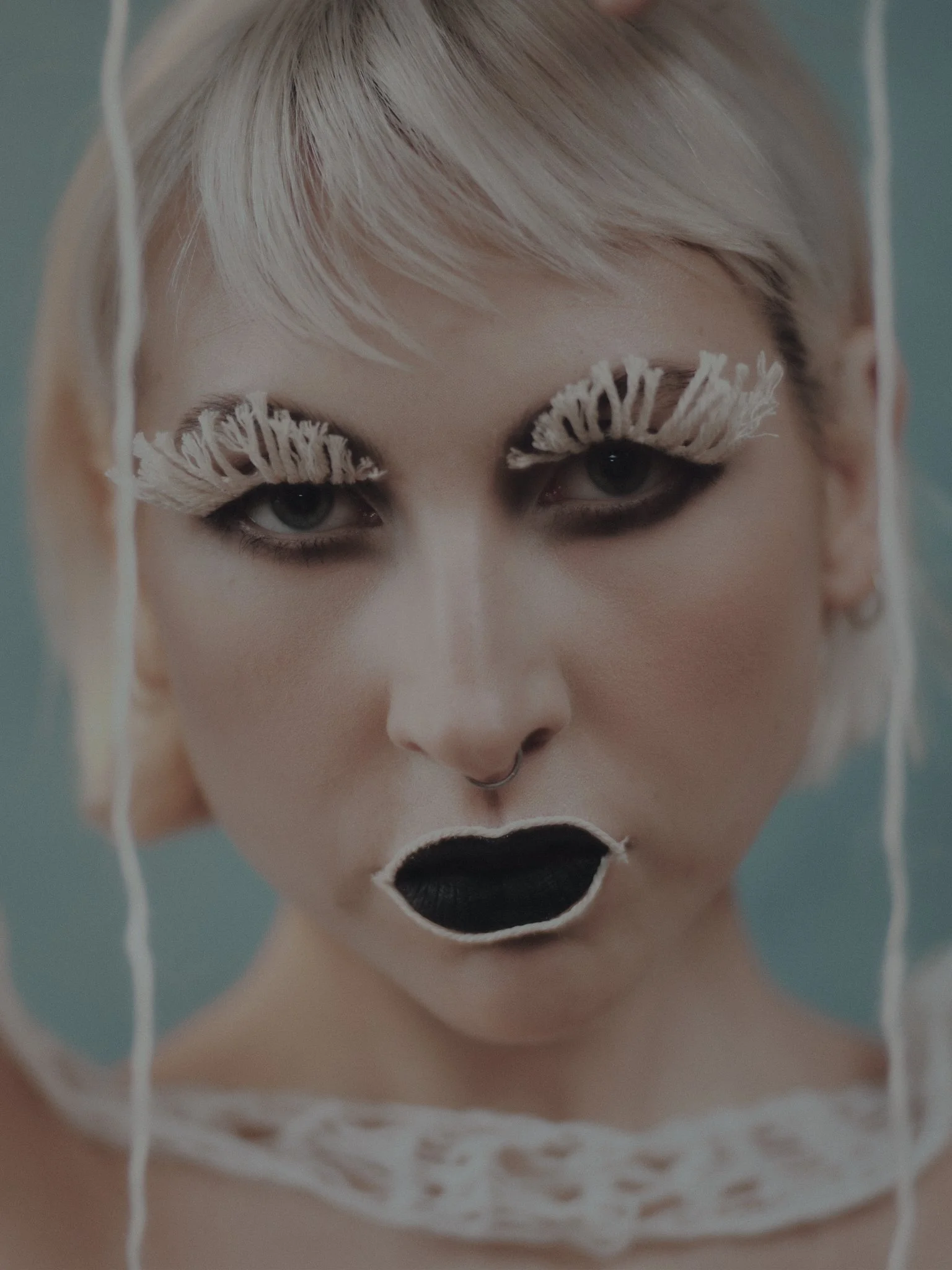 Refined, skin focused makeup by Kinga featuring bold handmade lashes made out of twine string and a modern fashion aesthetic. Leeds based editorial makeup artist specialising in timeless, expressive beauty