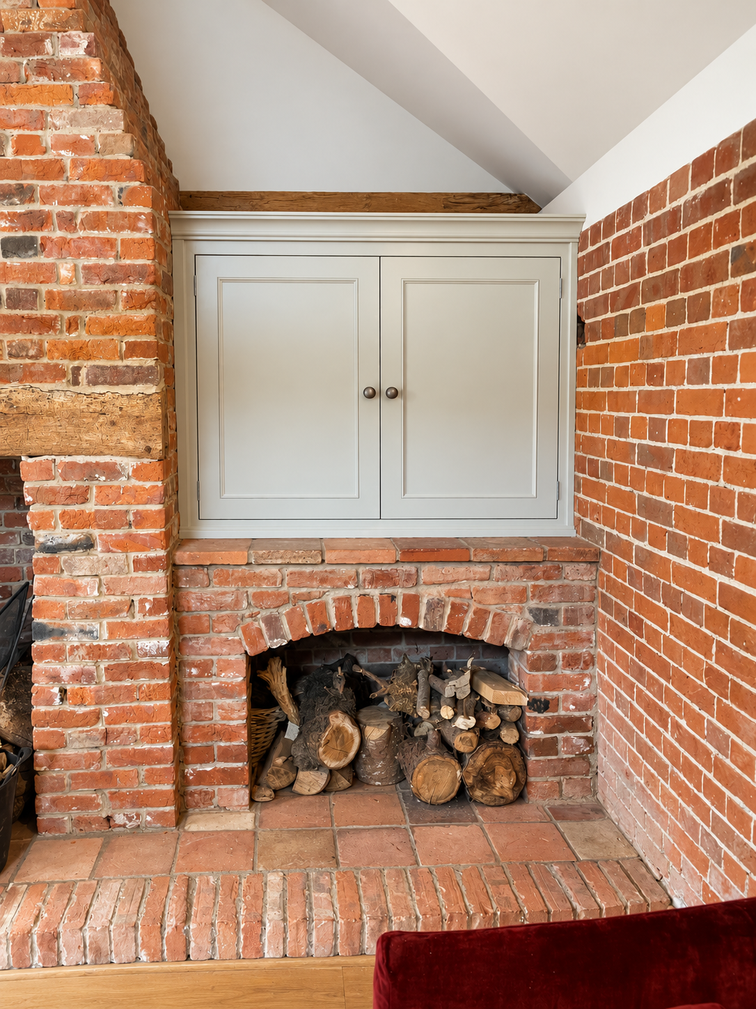 Rustic Brick Fireplace Alcove with Firewood.png