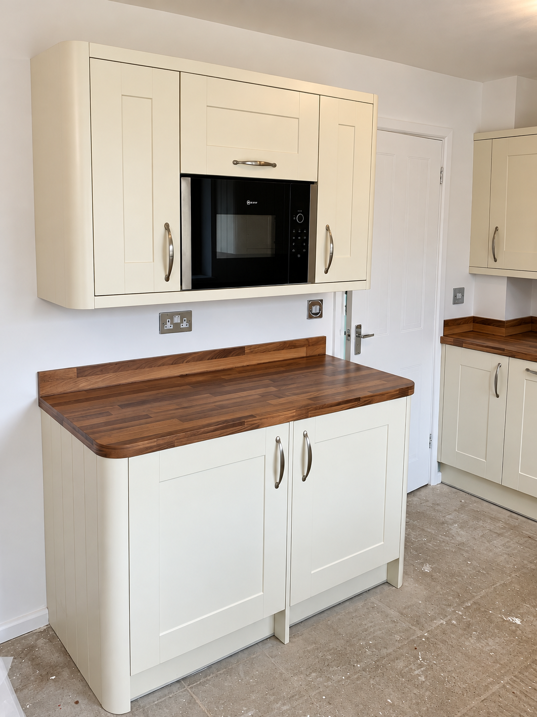 Freshly Fitted Cream Shaker Kitchen.png