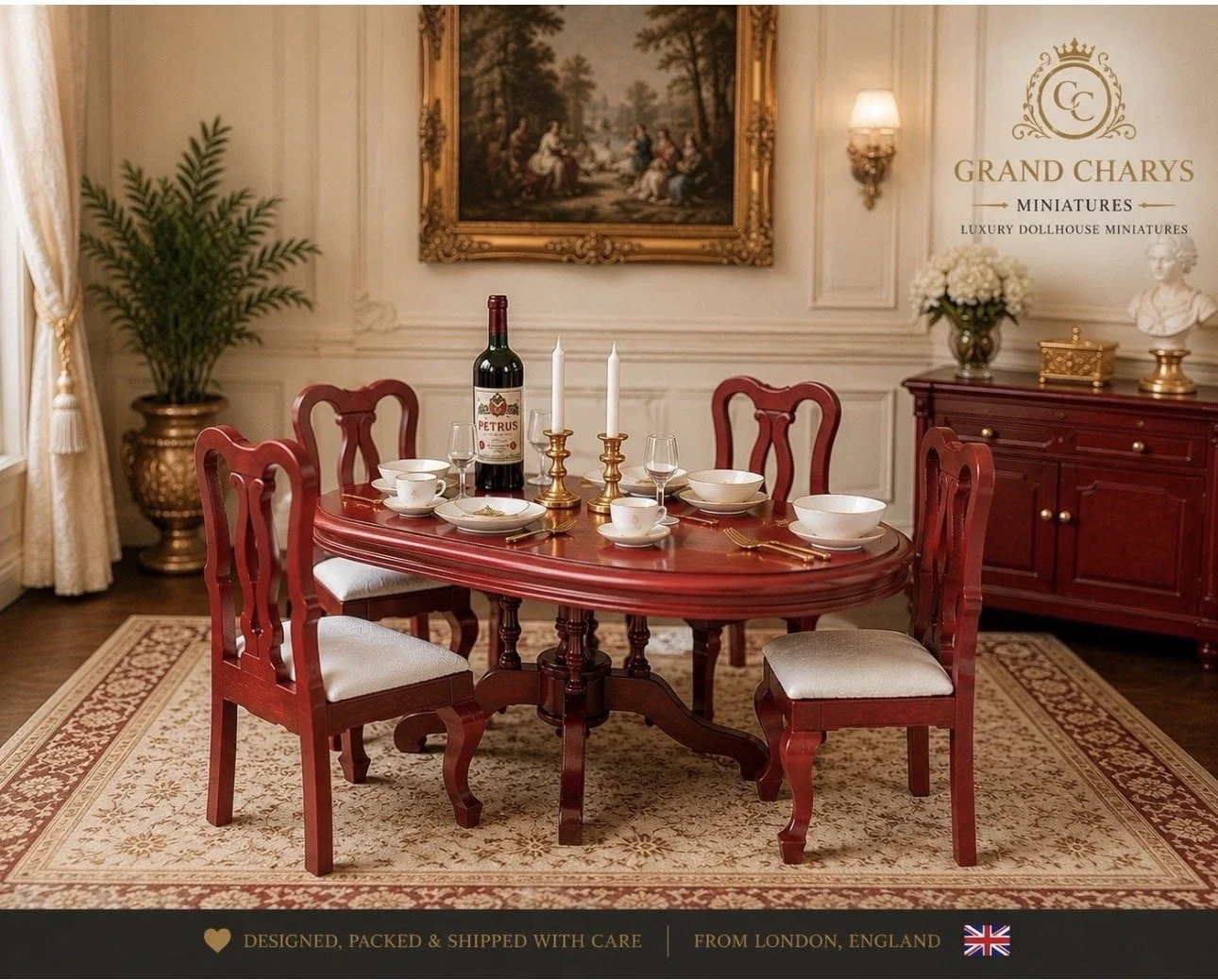 A formal dining room with a polished wooden oval table set with white china bowls, plates, cups, and gold-toned flatware. Gold candlesticks with white candles and a bottle of red wine are on the table. Six red wooden chairs with white cushioned seats surround the table. A large framed landscape painting hangs on the wall behind, and a sideboard on the right holds a bouquet of white flowers, a small sculpture, and gold decorative items. A large potted plant is in the corner, and a patterned rug covers the floor. The room has beige paneled walls with warm lighting.
