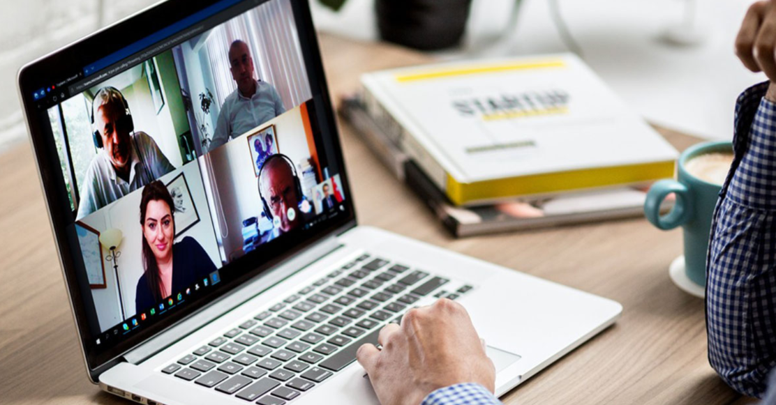 Online English lessons with a teacher helping students improve their language skills