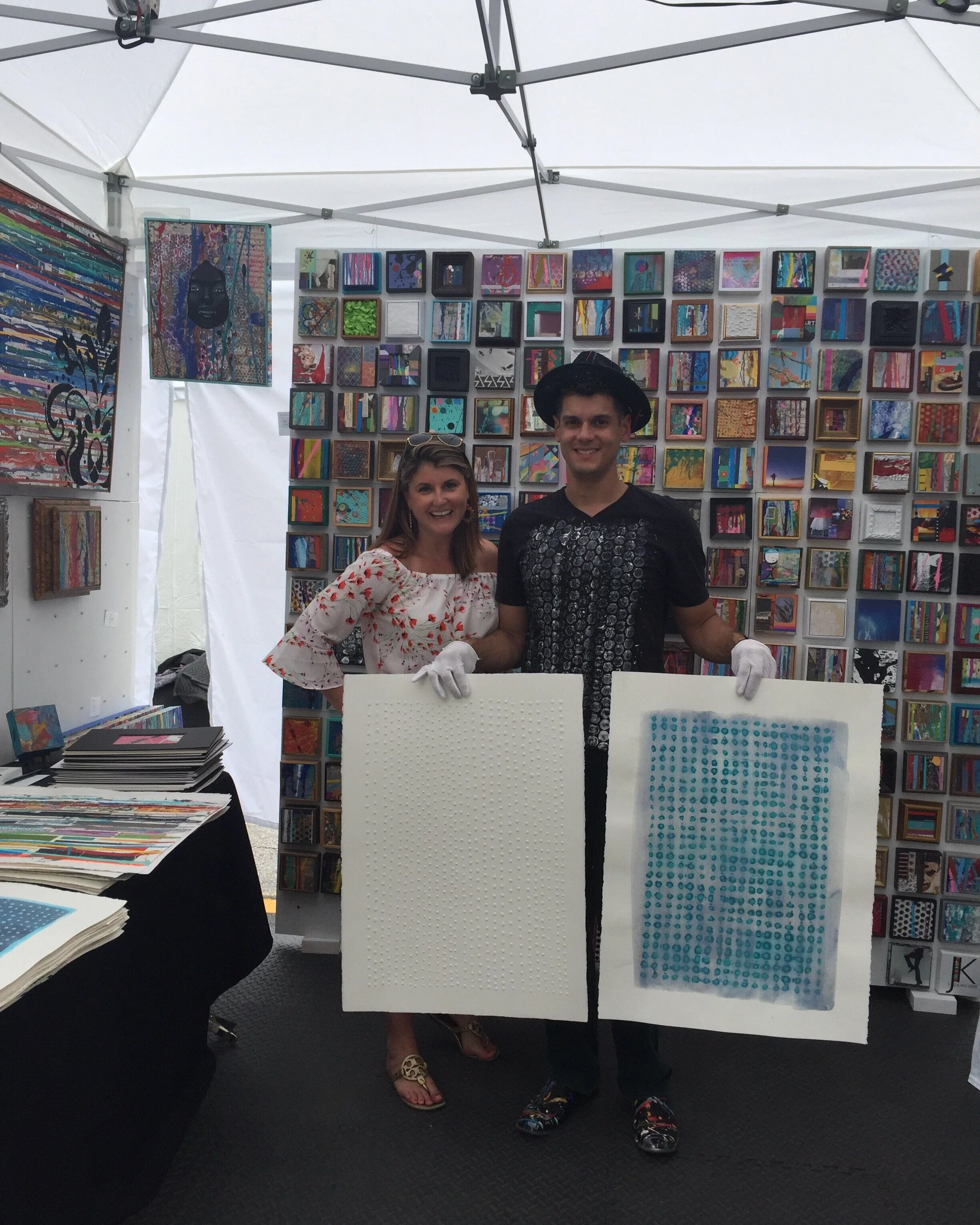 Julien Kerr (Artist) and Susan LaFleur selecting art 'Count your Blessings' at the Coconut Grove Art Festival, 2017.