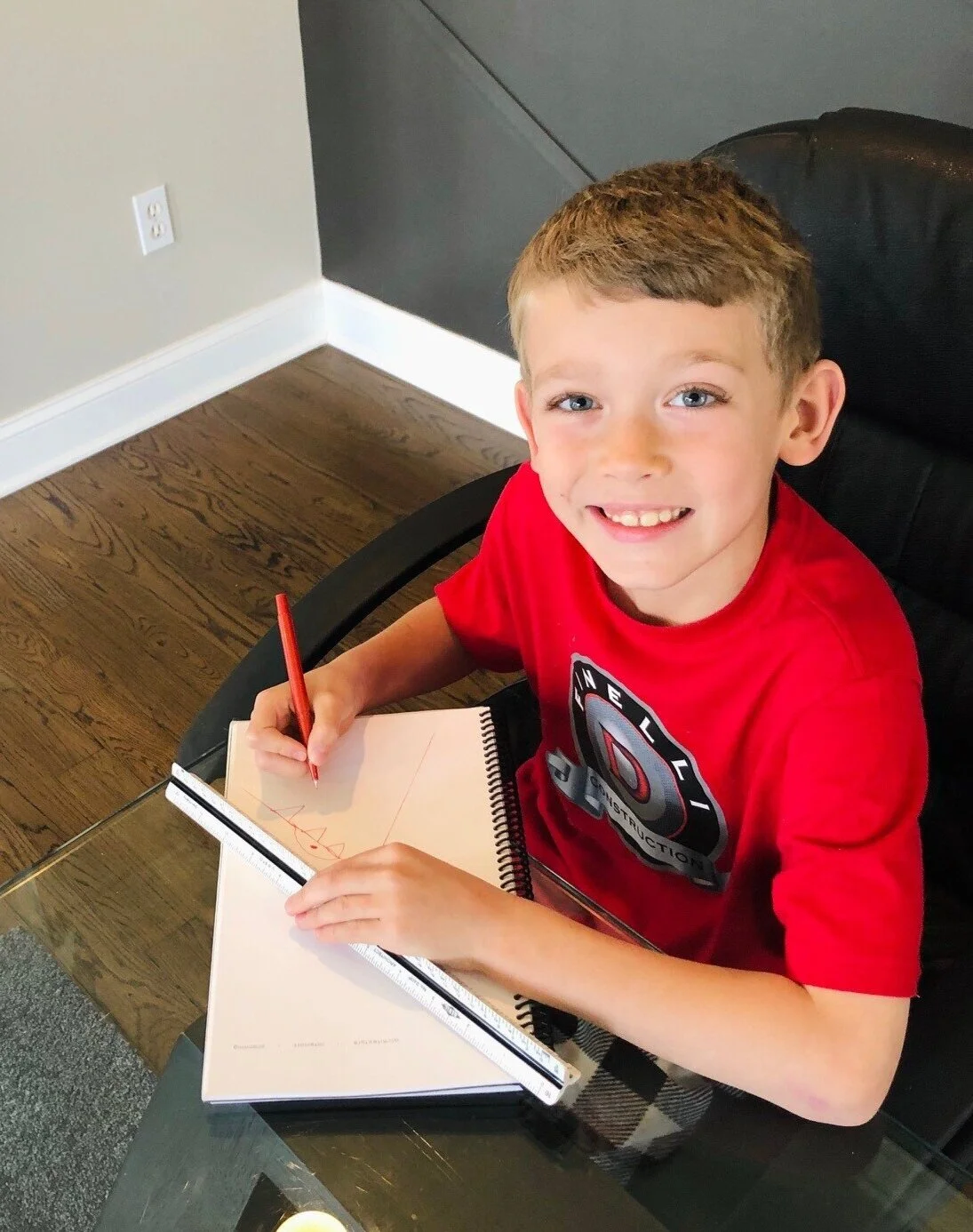 Kathy’s son, practicing his measuring and sketching skills with mom.