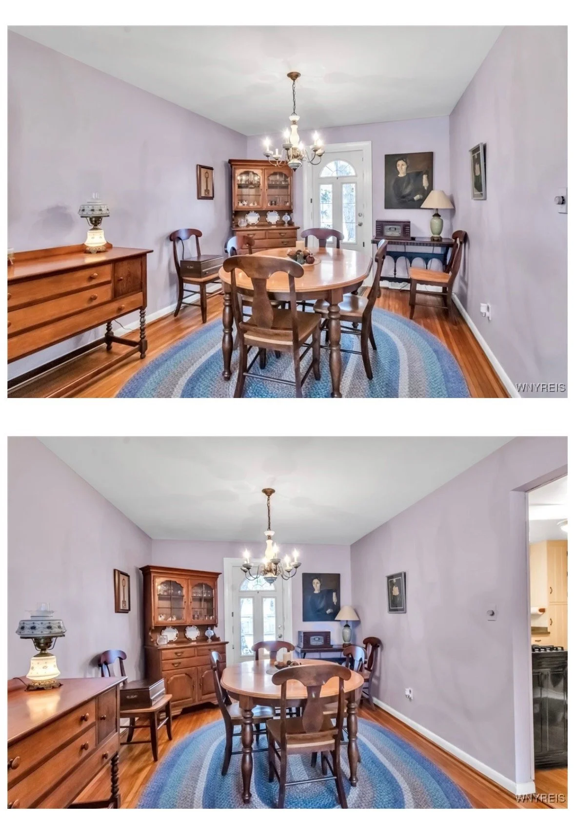 Dining room with purple walls, wooden table and chairs, a china cabinet, a sideboard with a lamp, framed artwork, a chandelier, and a braided oval rug.