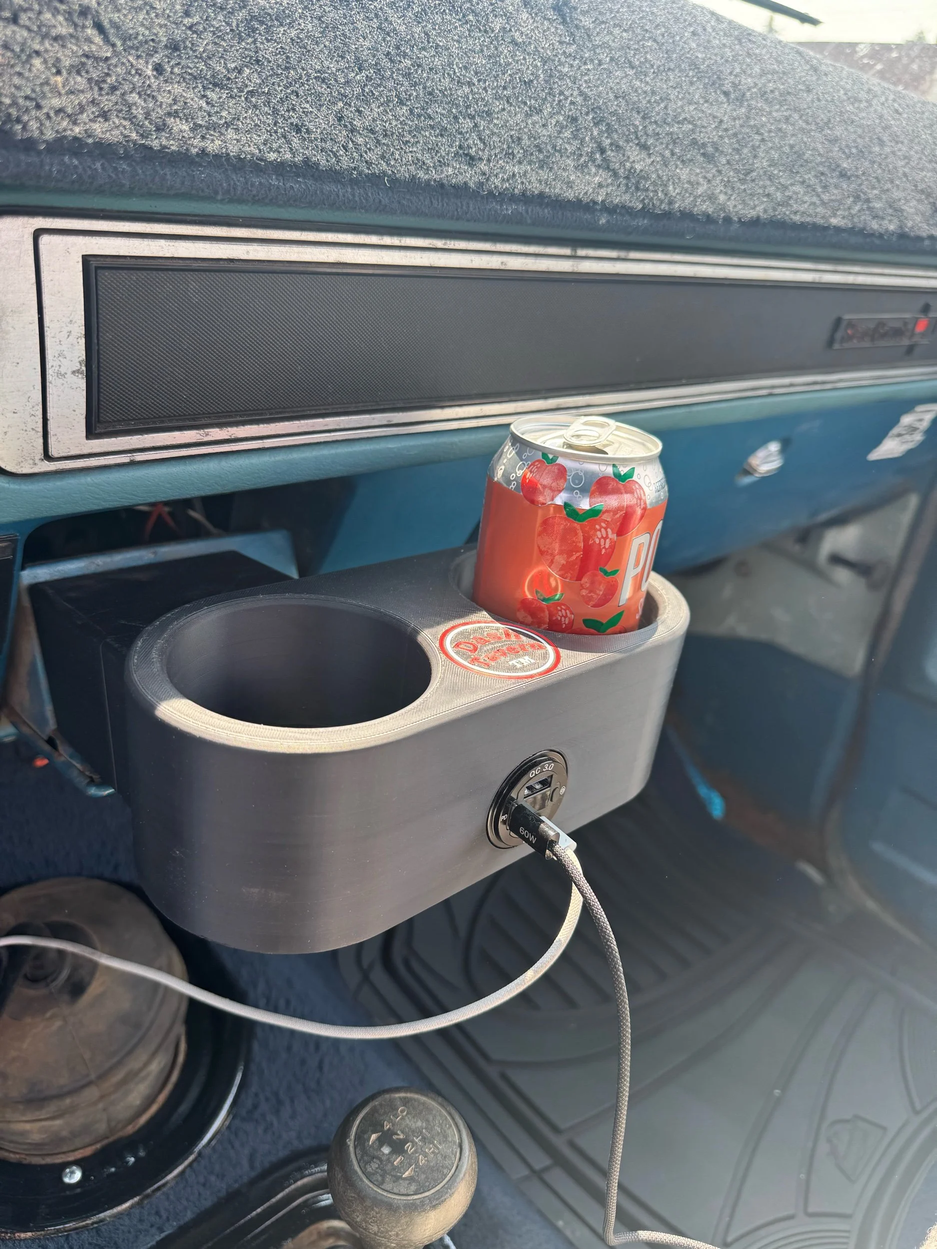 Dash Tavern 1973–1991 Chevy and GMC Squarebody cup holder installed in the factory ashtray opening with dual cup holders and USB-C charging