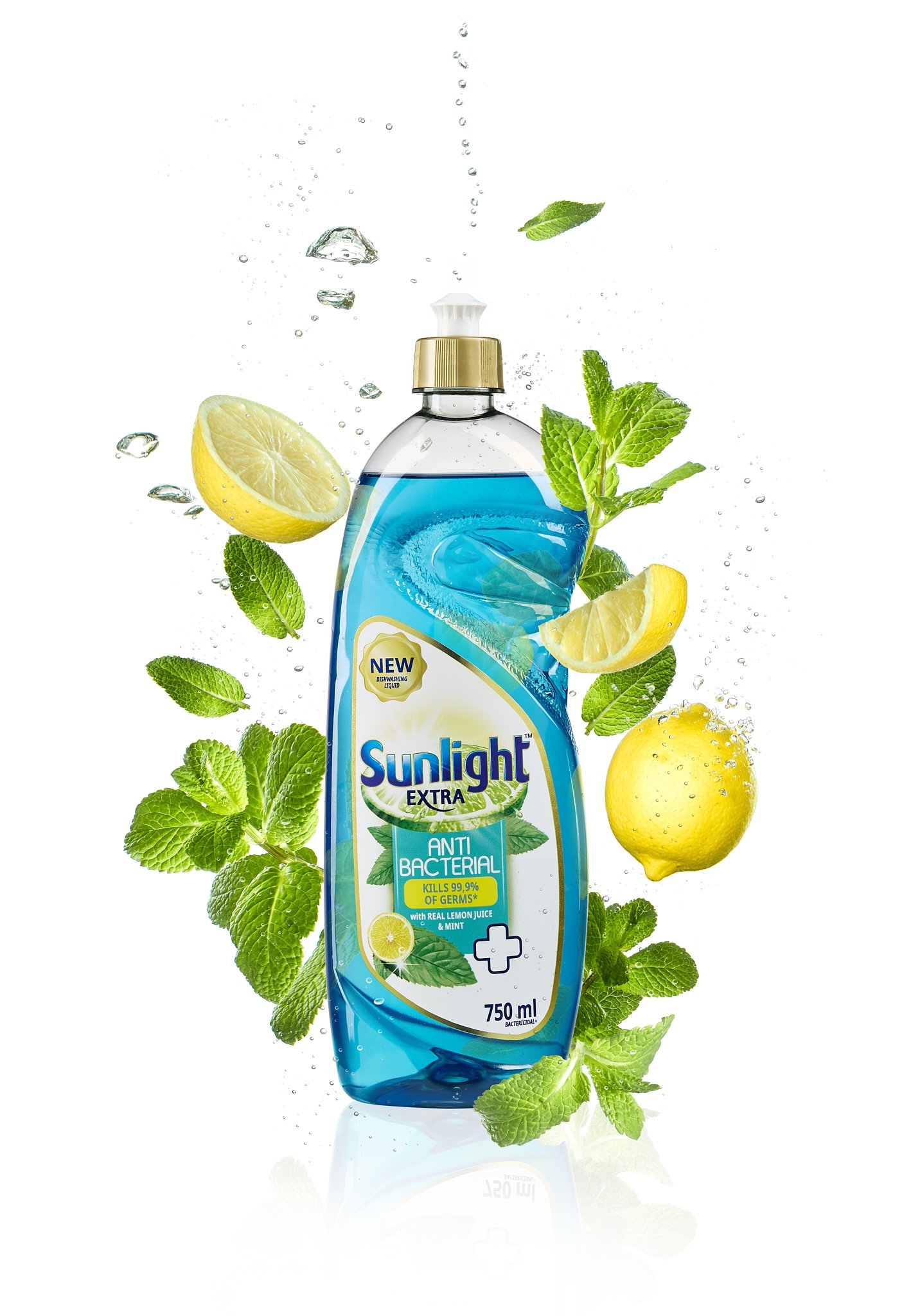 A bottle of Sunlight extra anti-bacterial dishwashing liquid with lemon and mint scent, surrounded by lemon slices and fresh mint leaves, with bubbles and water drops.