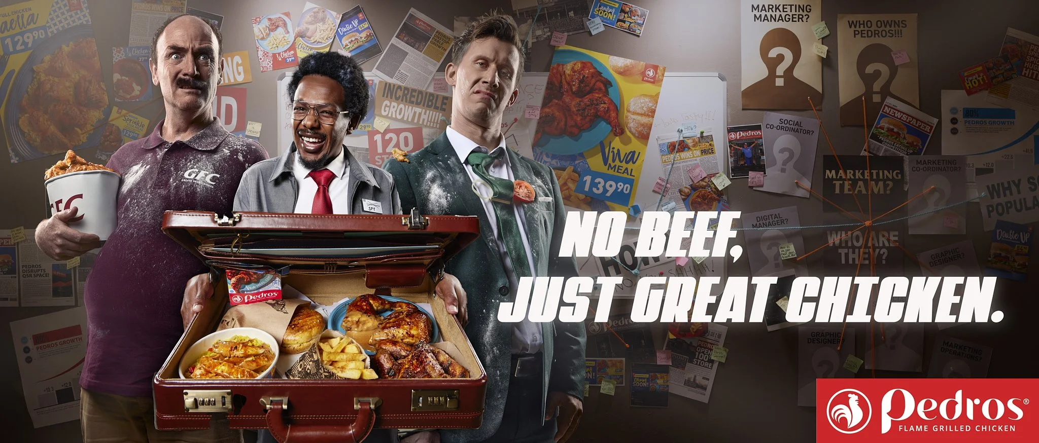 Three men dressed as detectives holding a box of fried chicken and French fries, with a cluttered bulletin board background covered with newspaper clippings, notes, and advertisements. One man is holding a bucket of fried chicken, and the middle man 