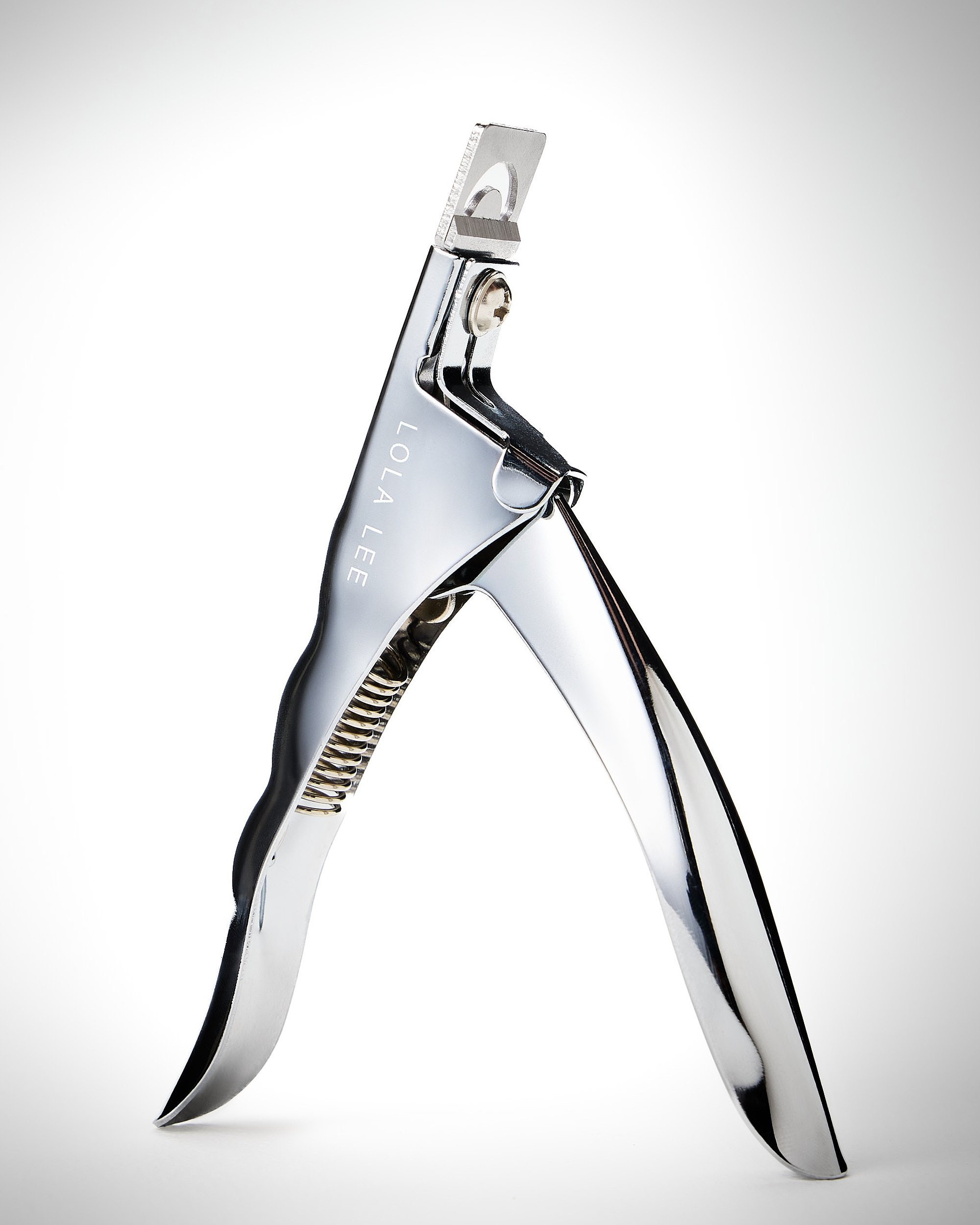 A close-up of a pair of nail clippers scissors with metallic handles and blades, positioned against a plain light grey background.