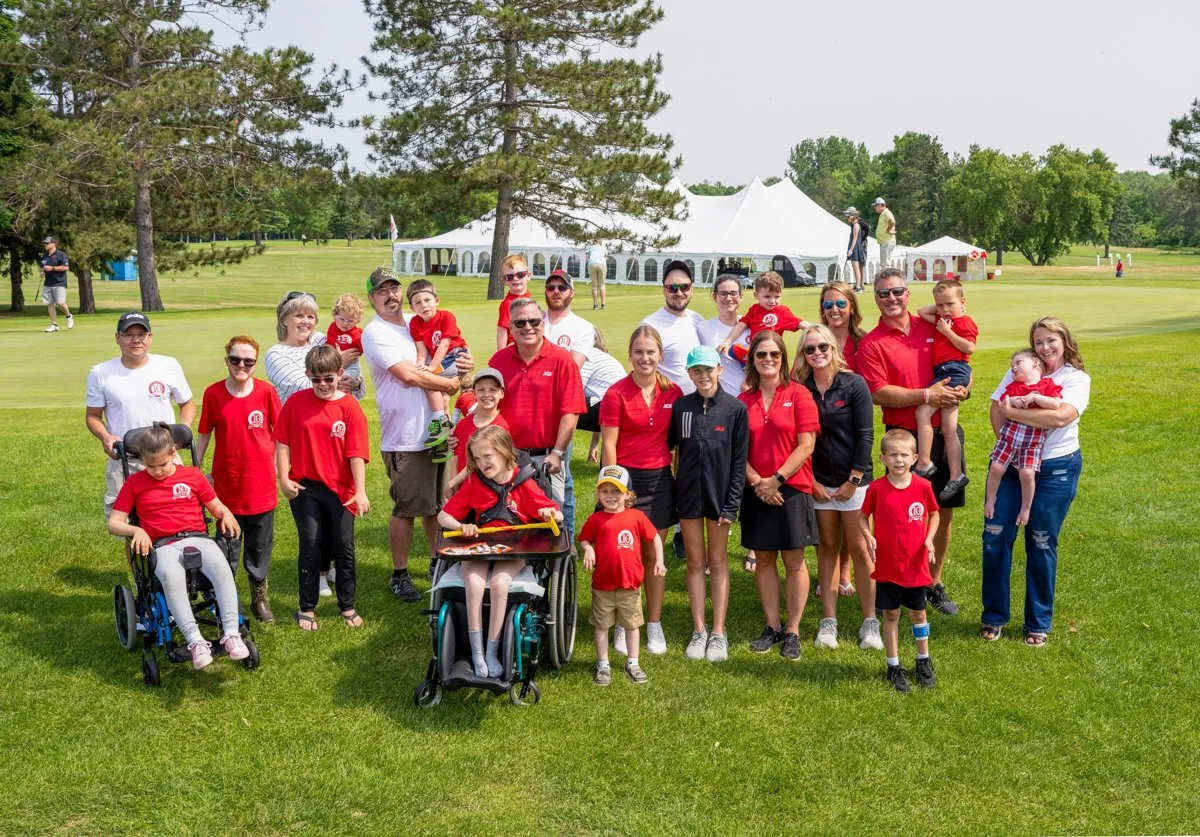 Burggraf's Ace Hardware team with the Grand Itasca All Stars and their families.