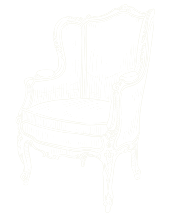 Black and white illustration of an ornate, vintage armchair with intricate wood carvings and upholstered seat and back.