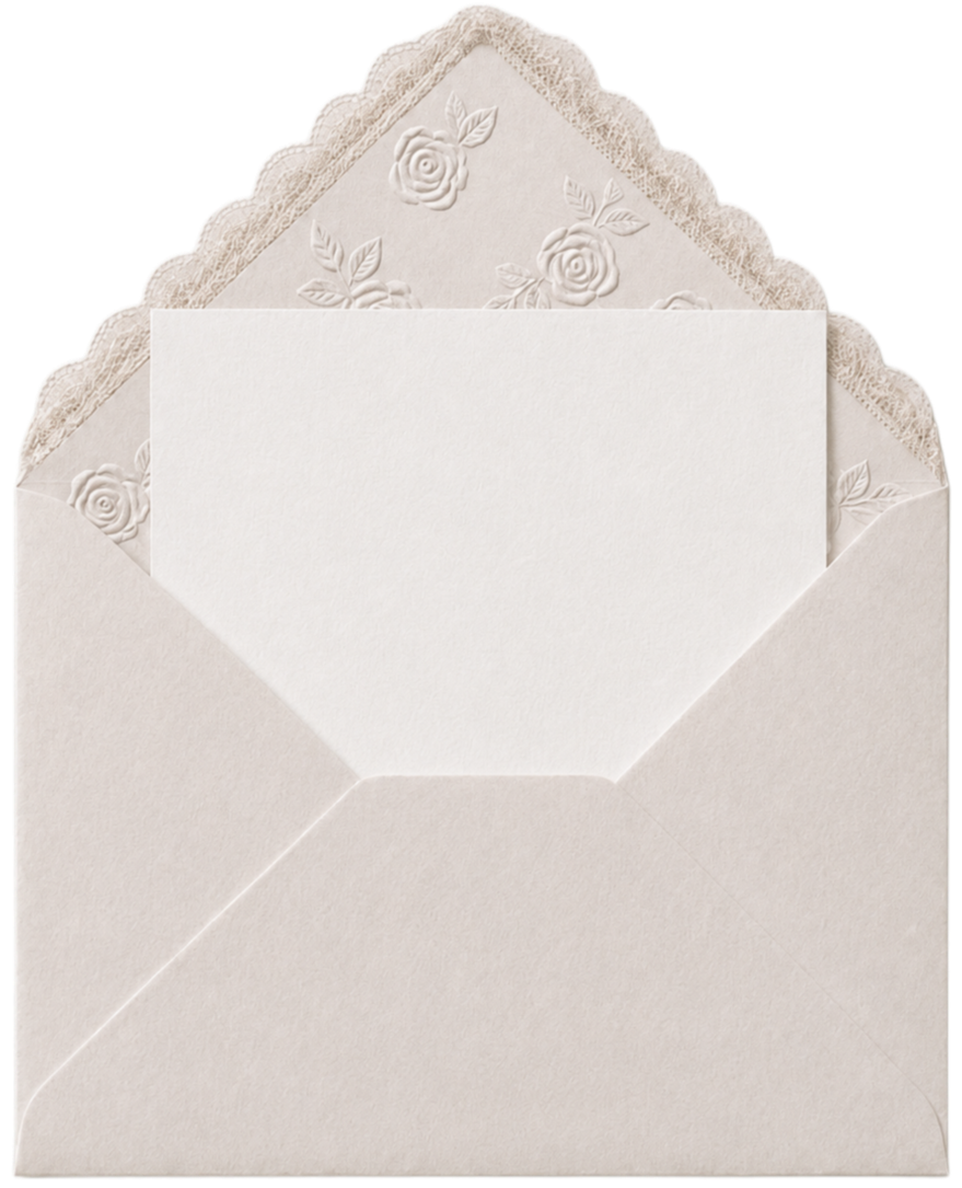 Cream-colored wedding invitation card inside an embossed envelope with floral design.