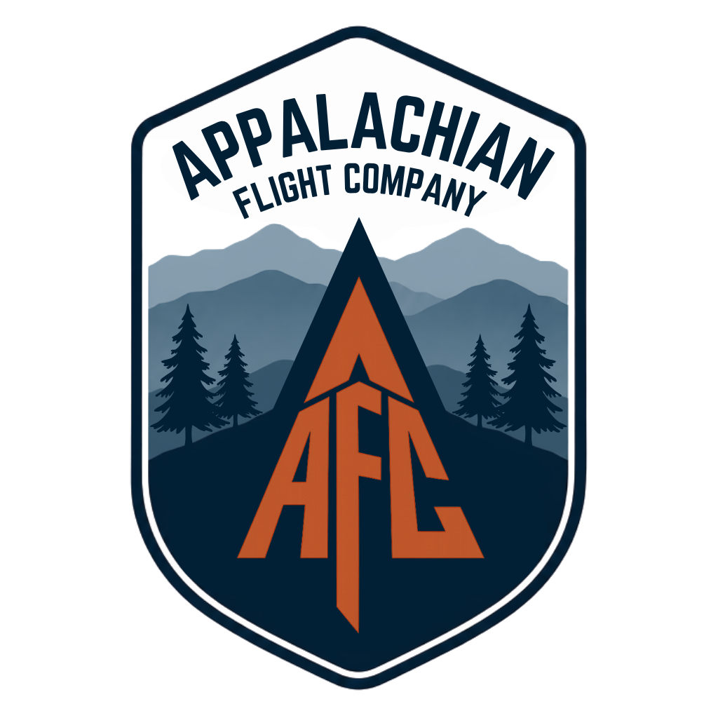 Patch for Appalachian Flight Company featuring a mountain landscape, pine trees, and a stylized airplane with the letters AFC.