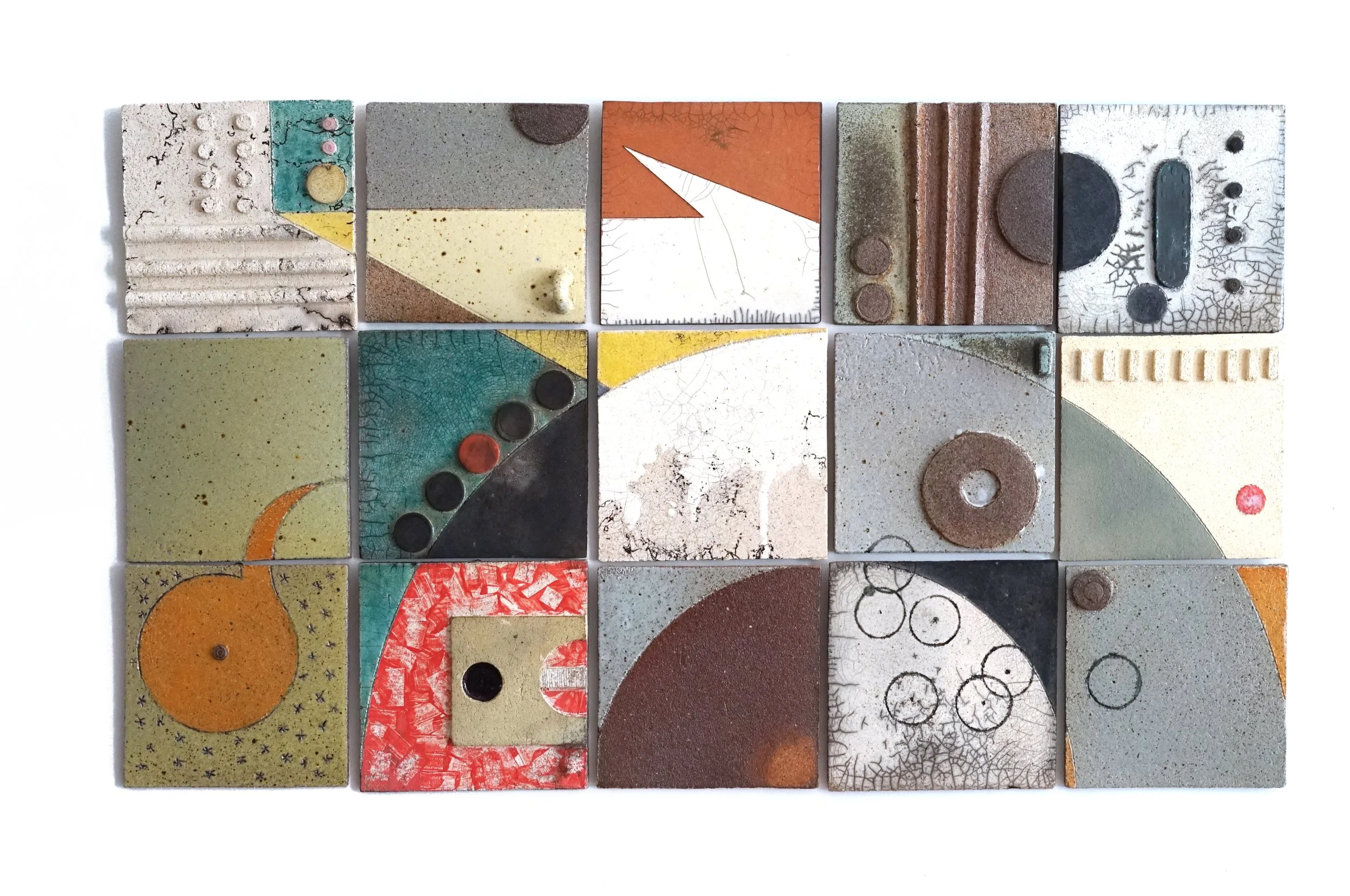 "Proximity."
15 individual tablets each 8 x 8 inches. Various clay bodies. Raku and soda fired.
40 x 24 inches.