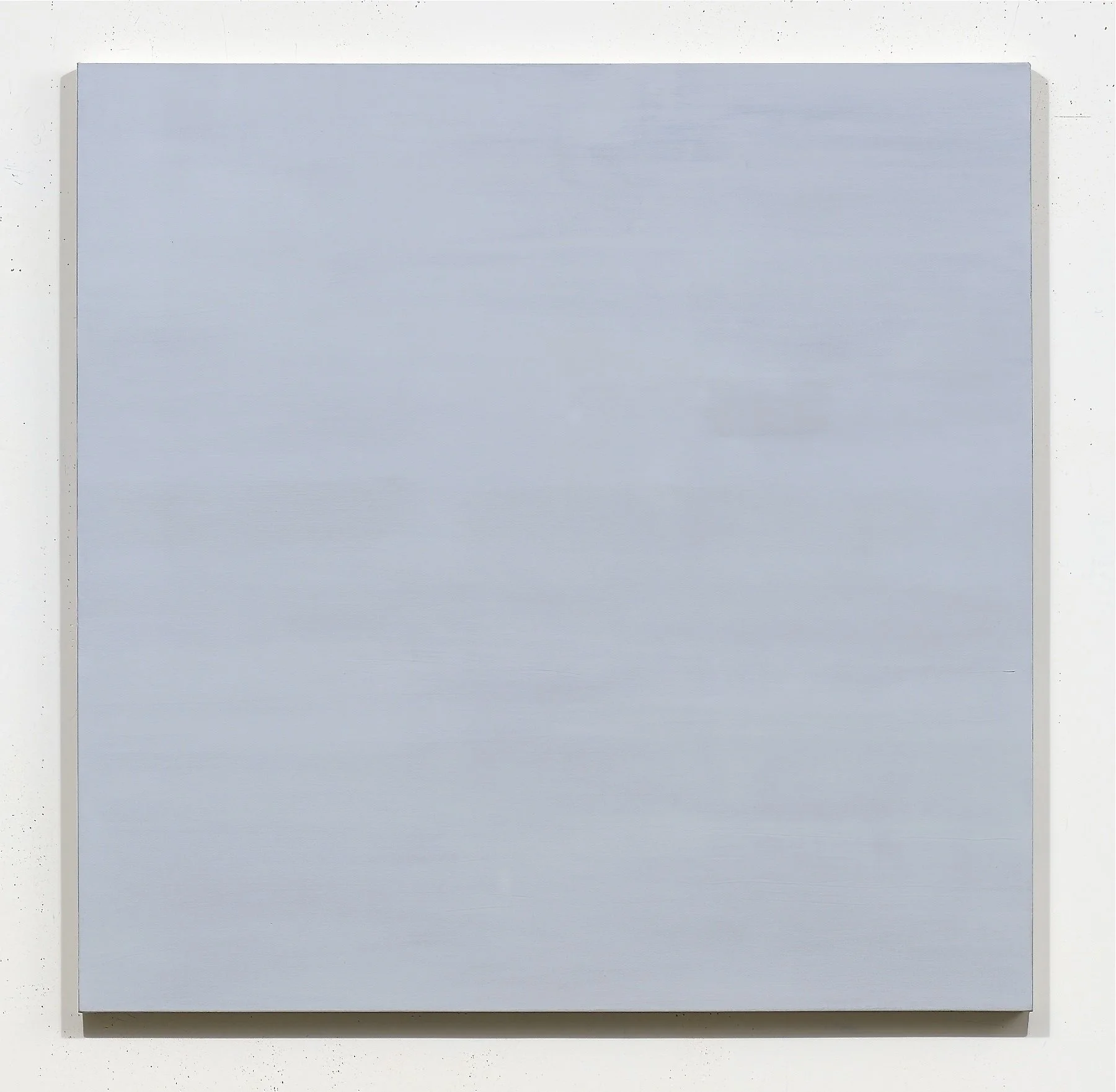 A plain white cardboard box with a textured surface, placed on a white background.
