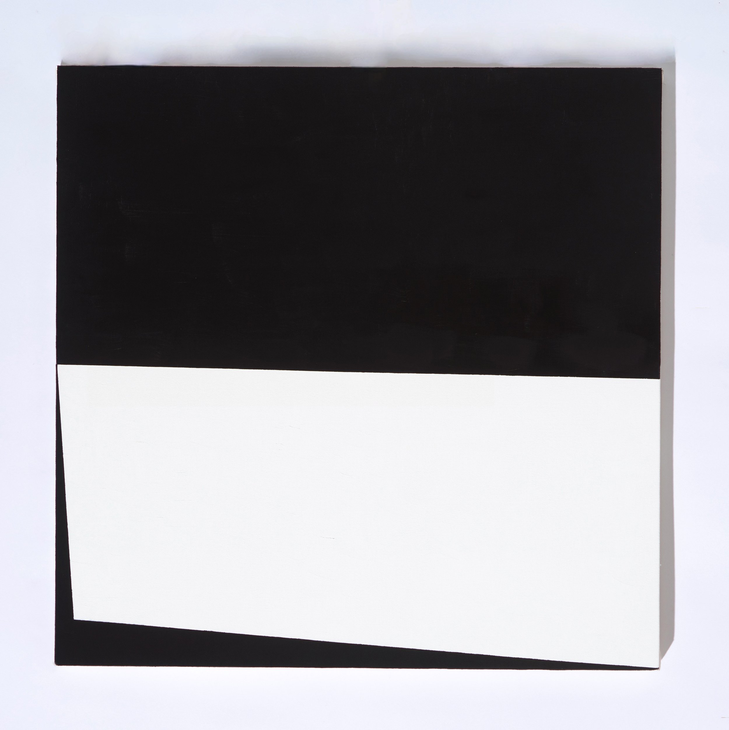 Black rectangle with a white border, placed on a white background.