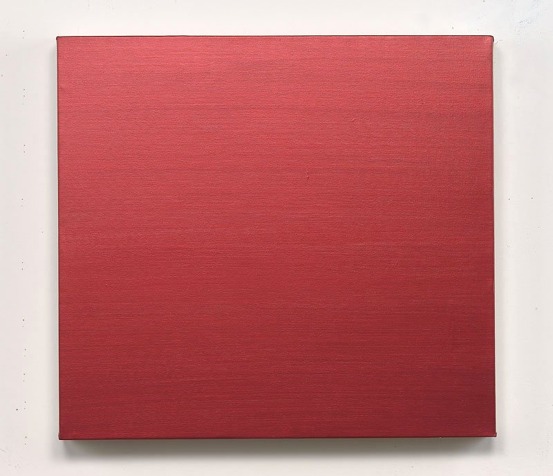 Red square canvas or panel with a textured surface, positioned on a white background.