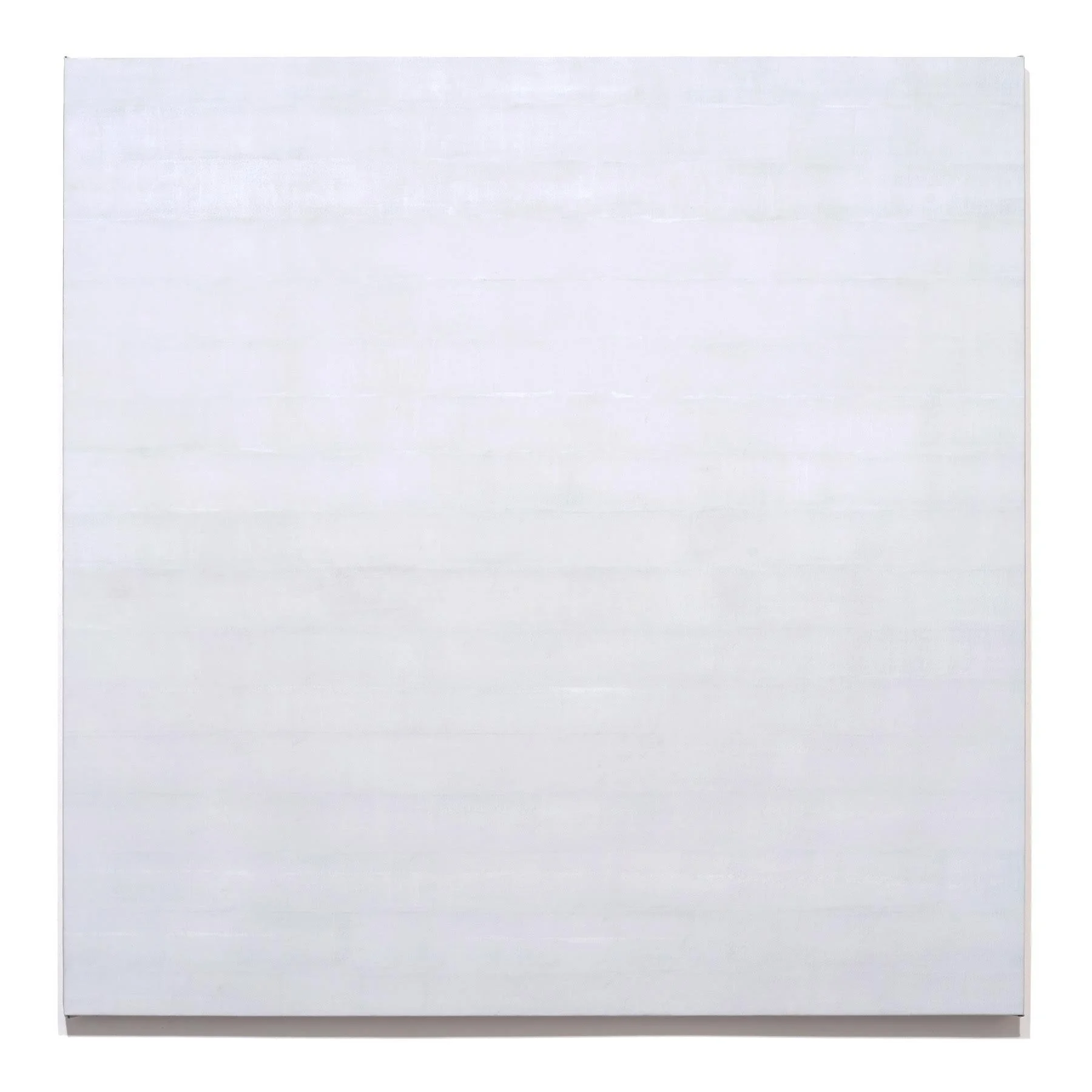 A white closed cardboard box viewed from the front with no labels or markings.
