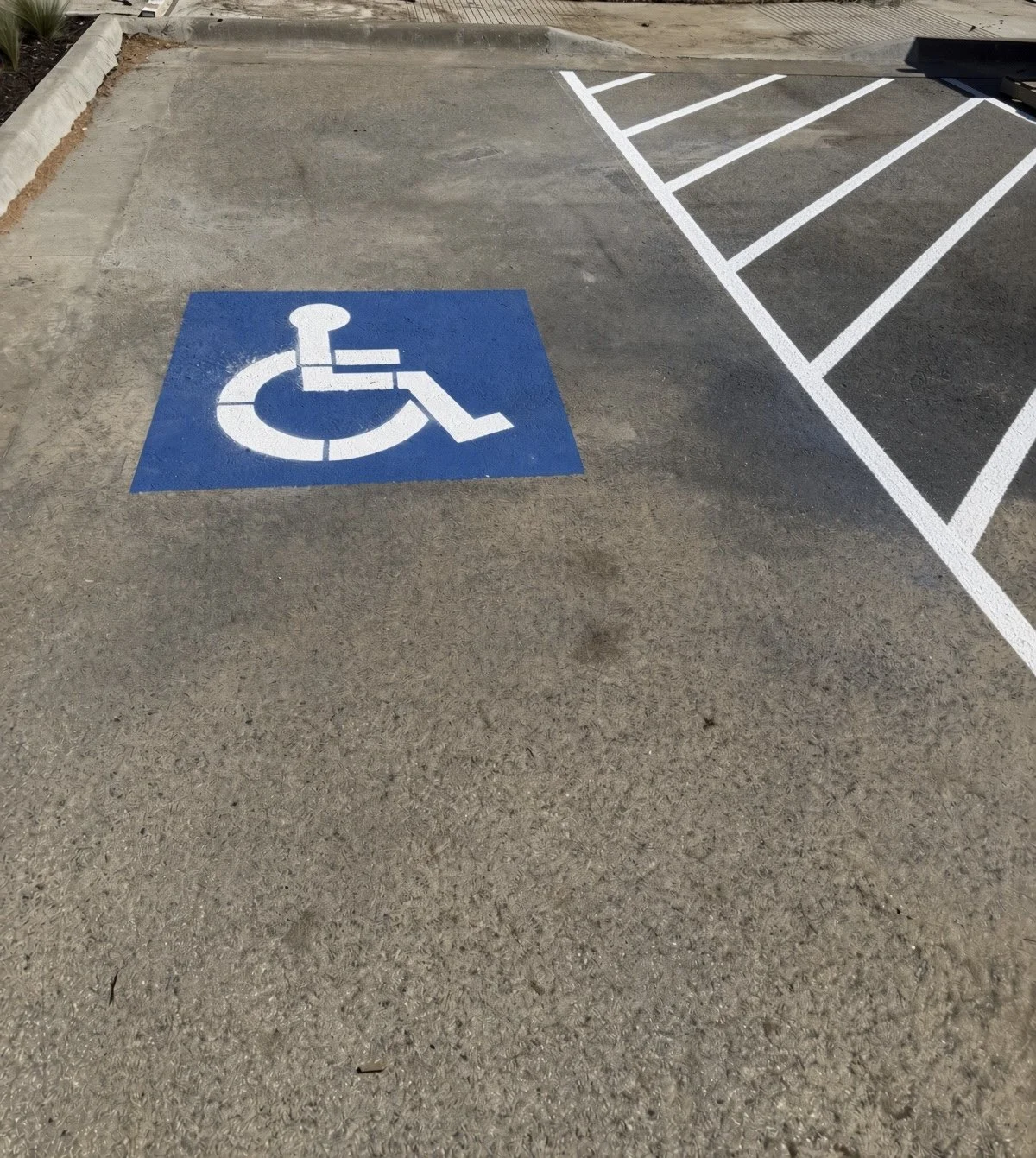 ADA accessible parking symbol and striping in Northwest Arkansas