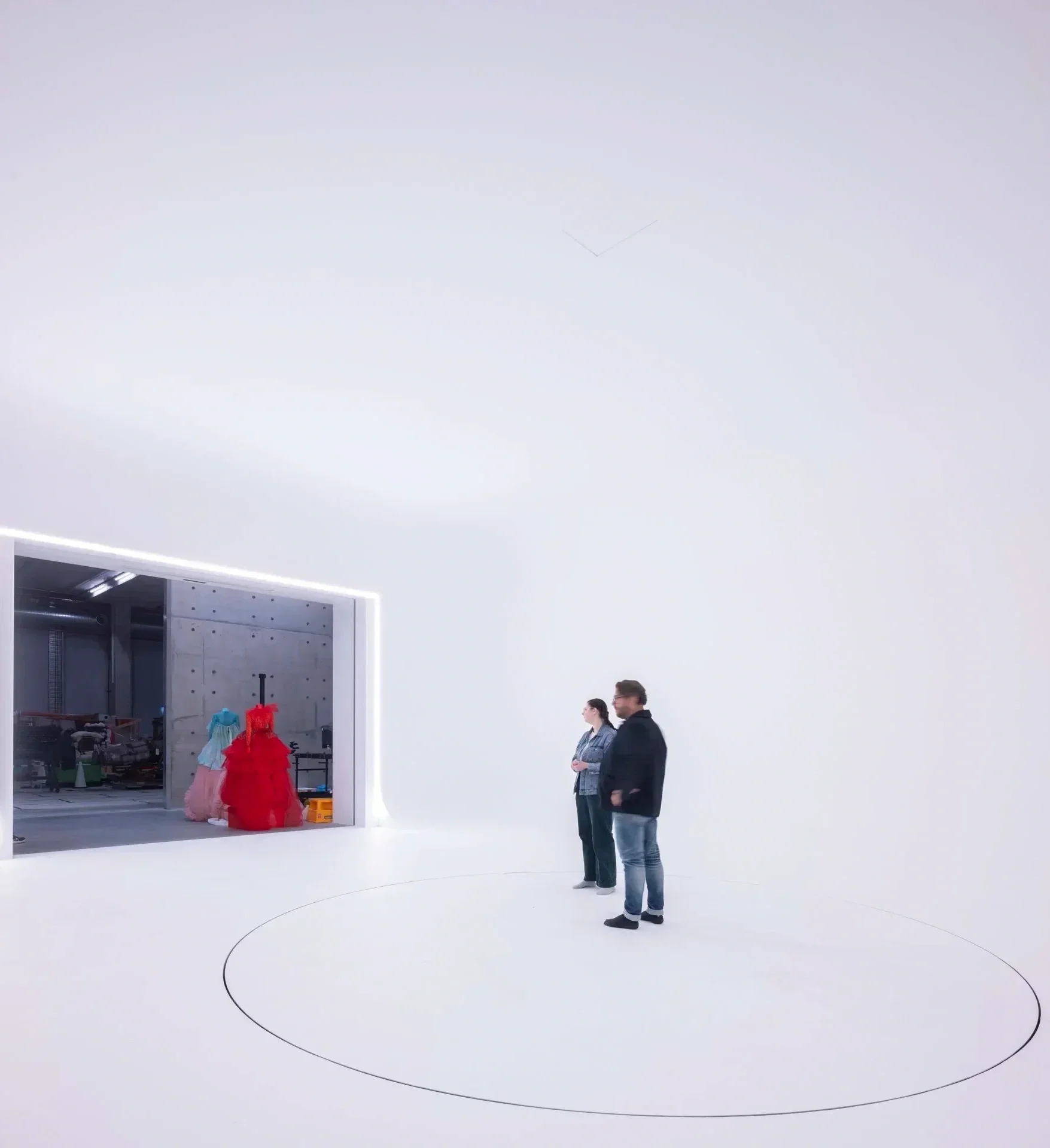 Large-format seamless white cyclorama studio with turntable