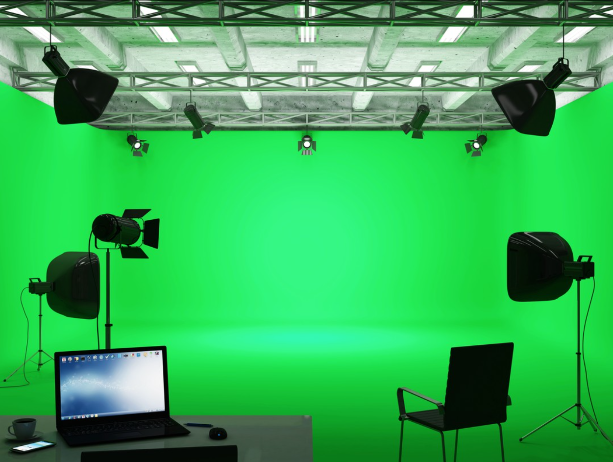 Video production set with lighting rig and green screen backdrop — Covingsmith