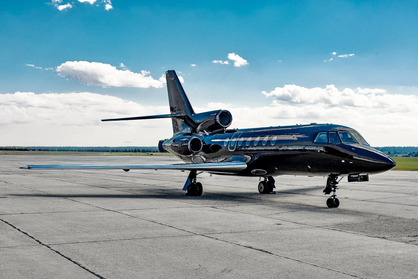 Private jet exterior on an airport ramp.