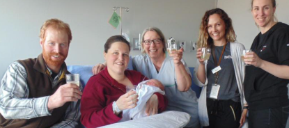 Midwife, Kathleen, and RNs, Malorie and Shannon, celebrating the first birth in the newly renovated maternity suites