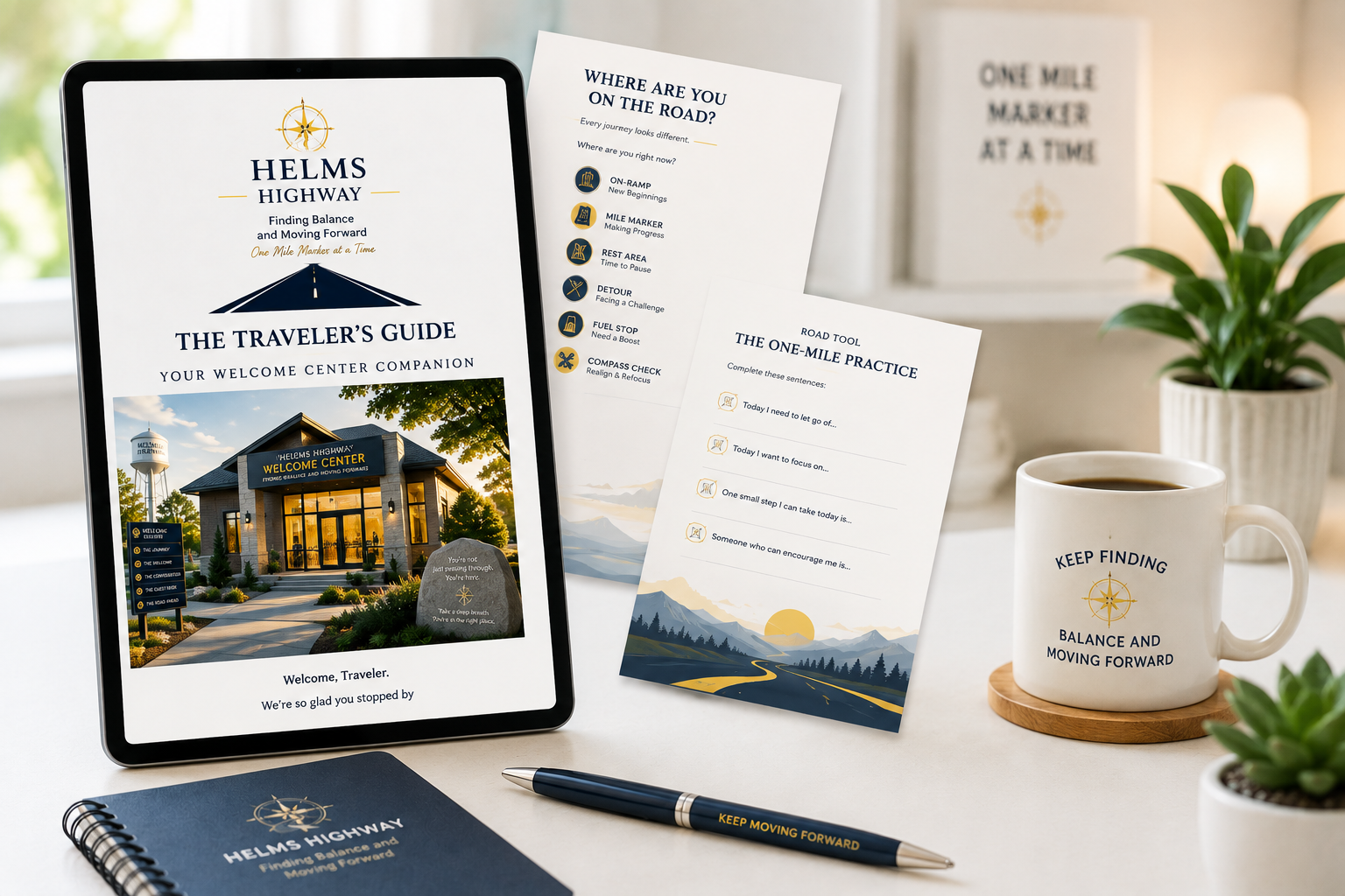 Promotional materials for Helms Highway include a tablet displaying a welcome center image, a booklet titled "Helms Highway", two informational sheets titled "Where Are You on the Road?" and "The One-Mile Practice", a white coffee mug with the words "Keep Finding Balance and Moving Forward", a black pen labeled "Keep Moving Forward", a potted plant, and a notebook, all on a beige table near a window.