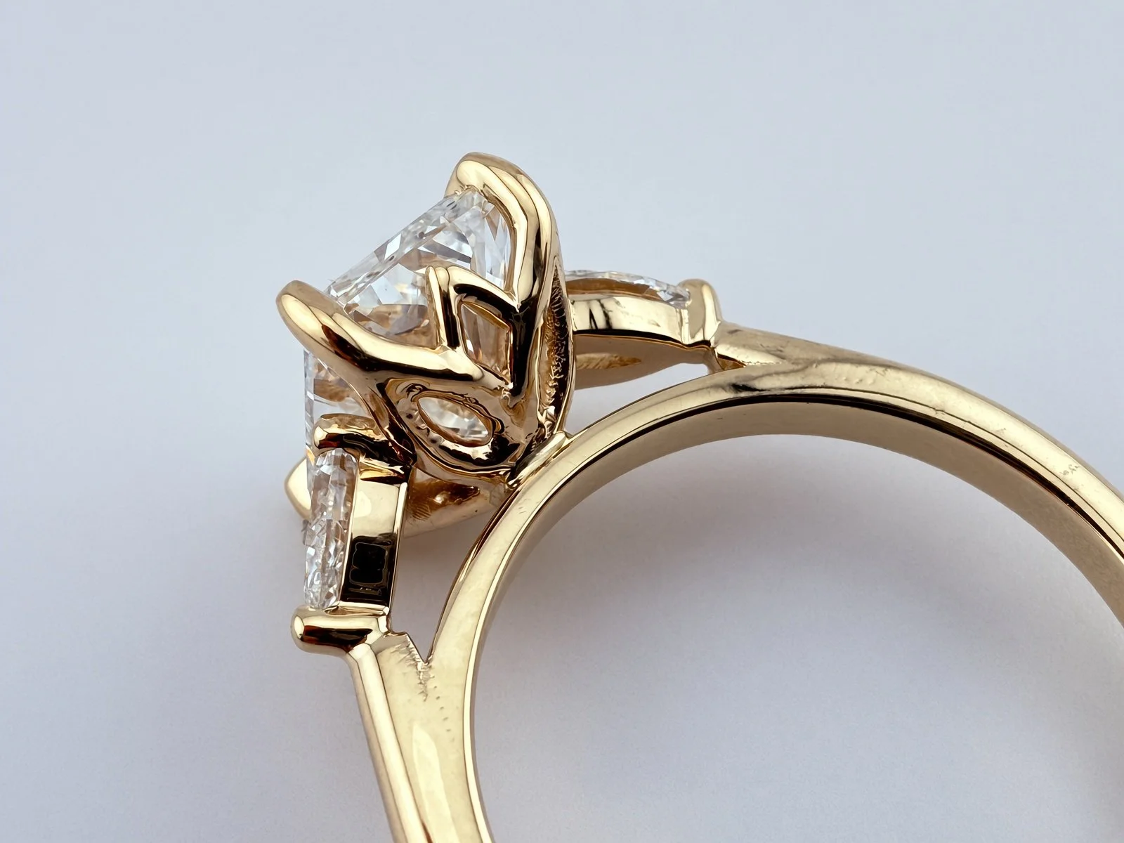 14k-yellow-gold-three-stone-ring-side.jpg.jpg