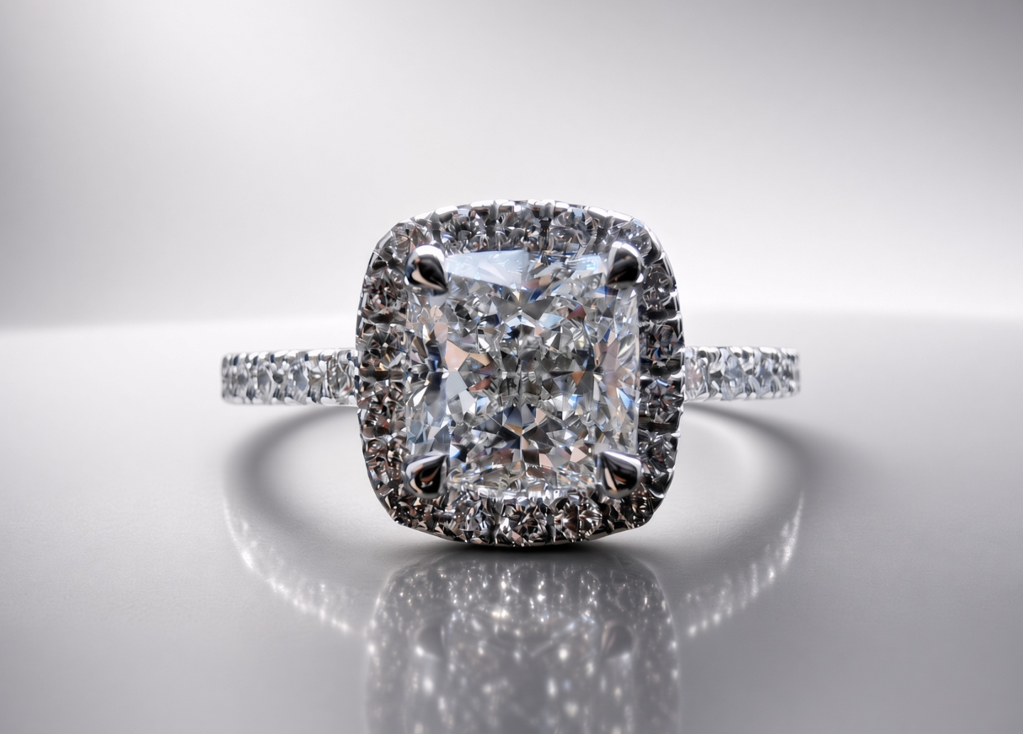 18k-white-gold-cushion-halo-cathedral-custom-engagement-ring-bonvold.webp