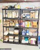 Shelves stocked with linens, soaps, paper goods and coffee for Airbnb host restock supplies