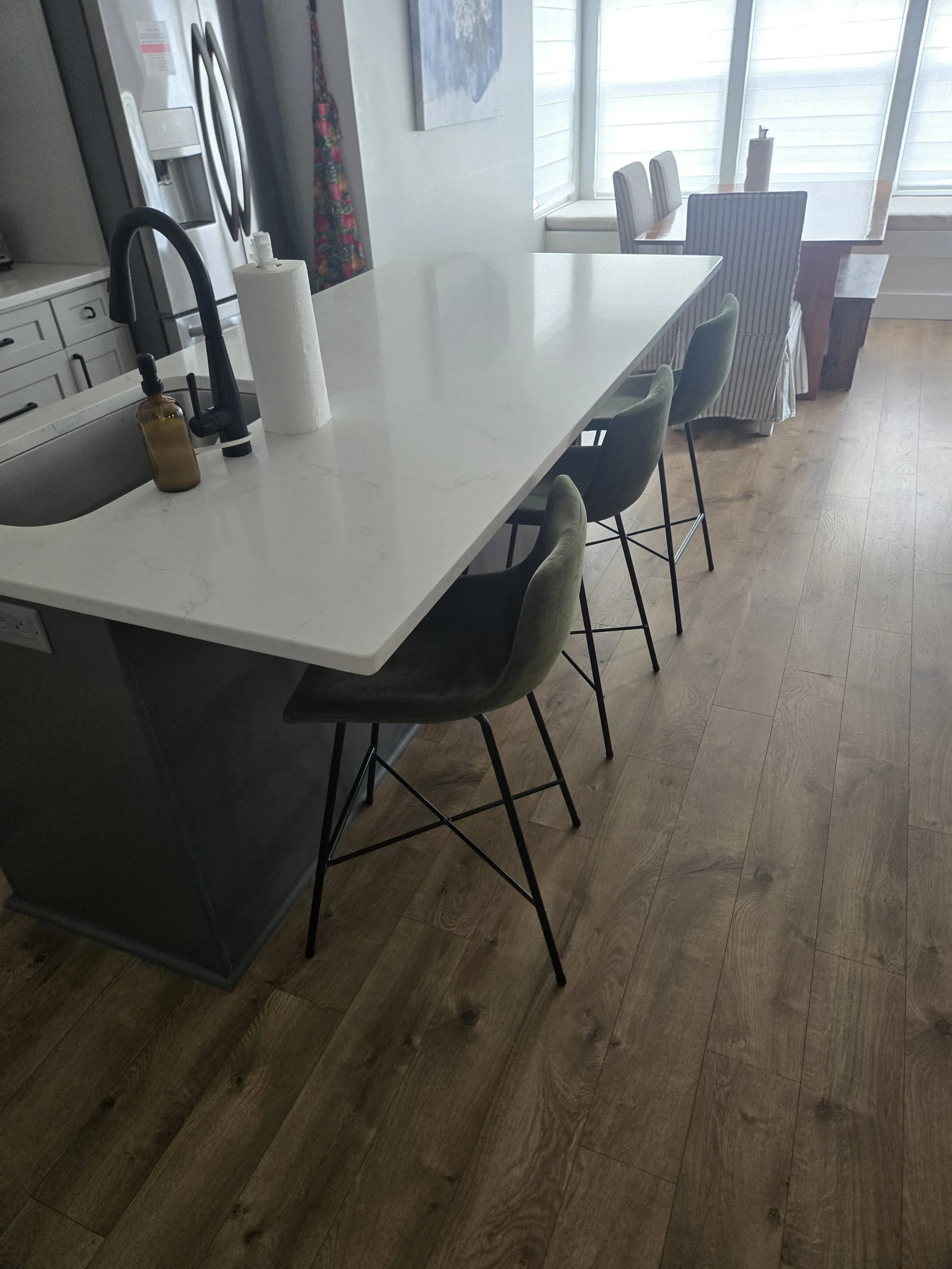 Clean kitchen island and counters after a house cleaning in Pendleton, IN