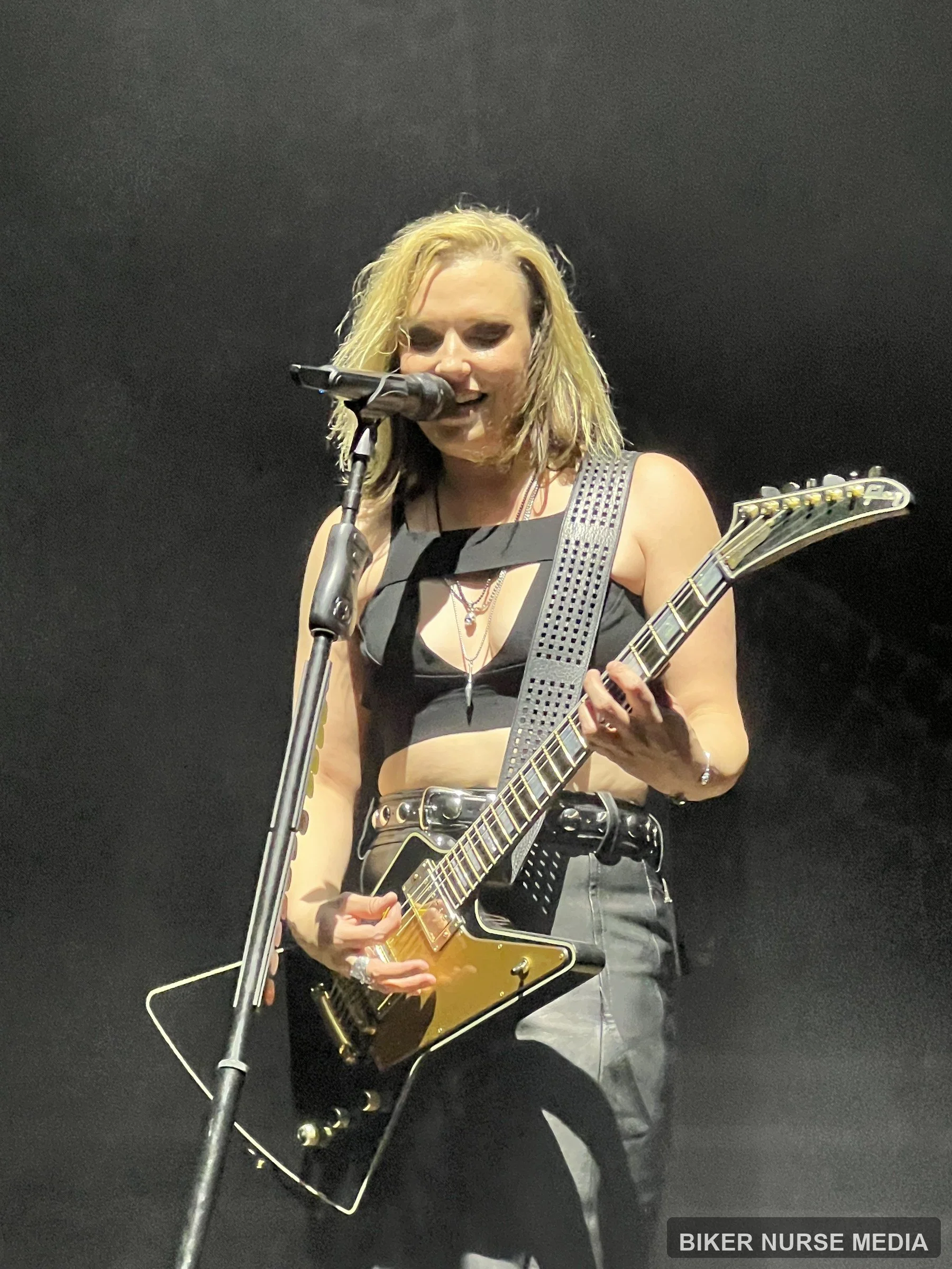 Halestorm guitarist performing live, photographed by Biker Nurse Media
