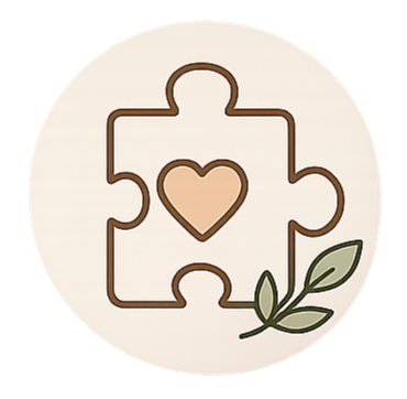 A puzzle piece with a heart in the center and two leaves in the bottom right corner.