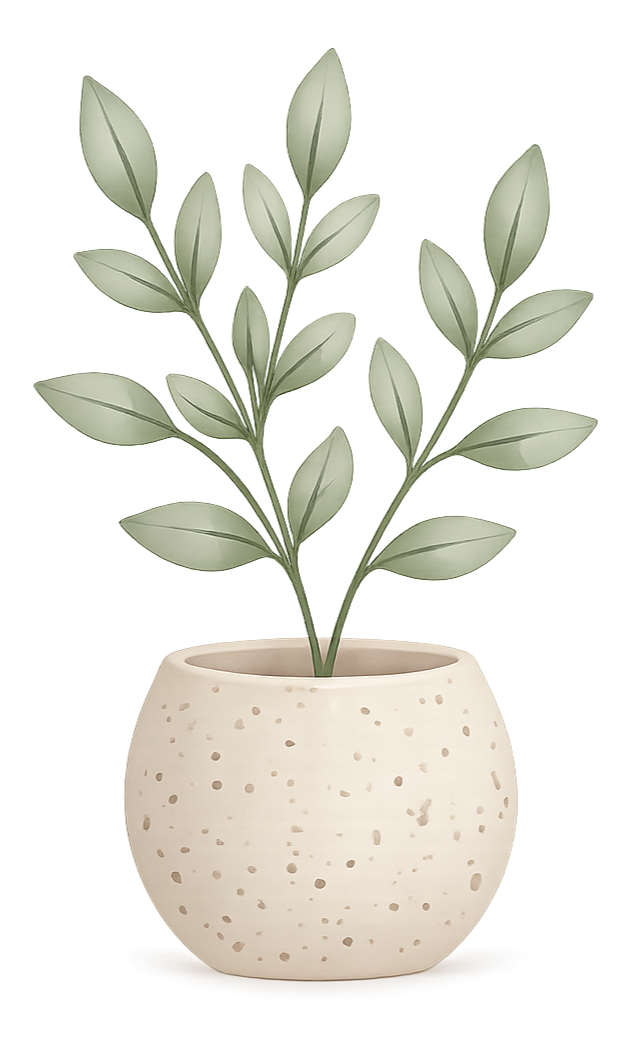 A potted plant with green leaves in a white, speckled round pot.