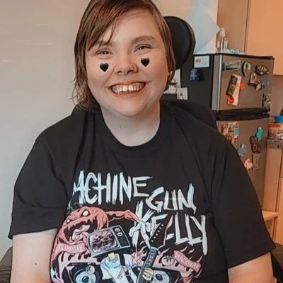 Sierra at home in a wheelchair