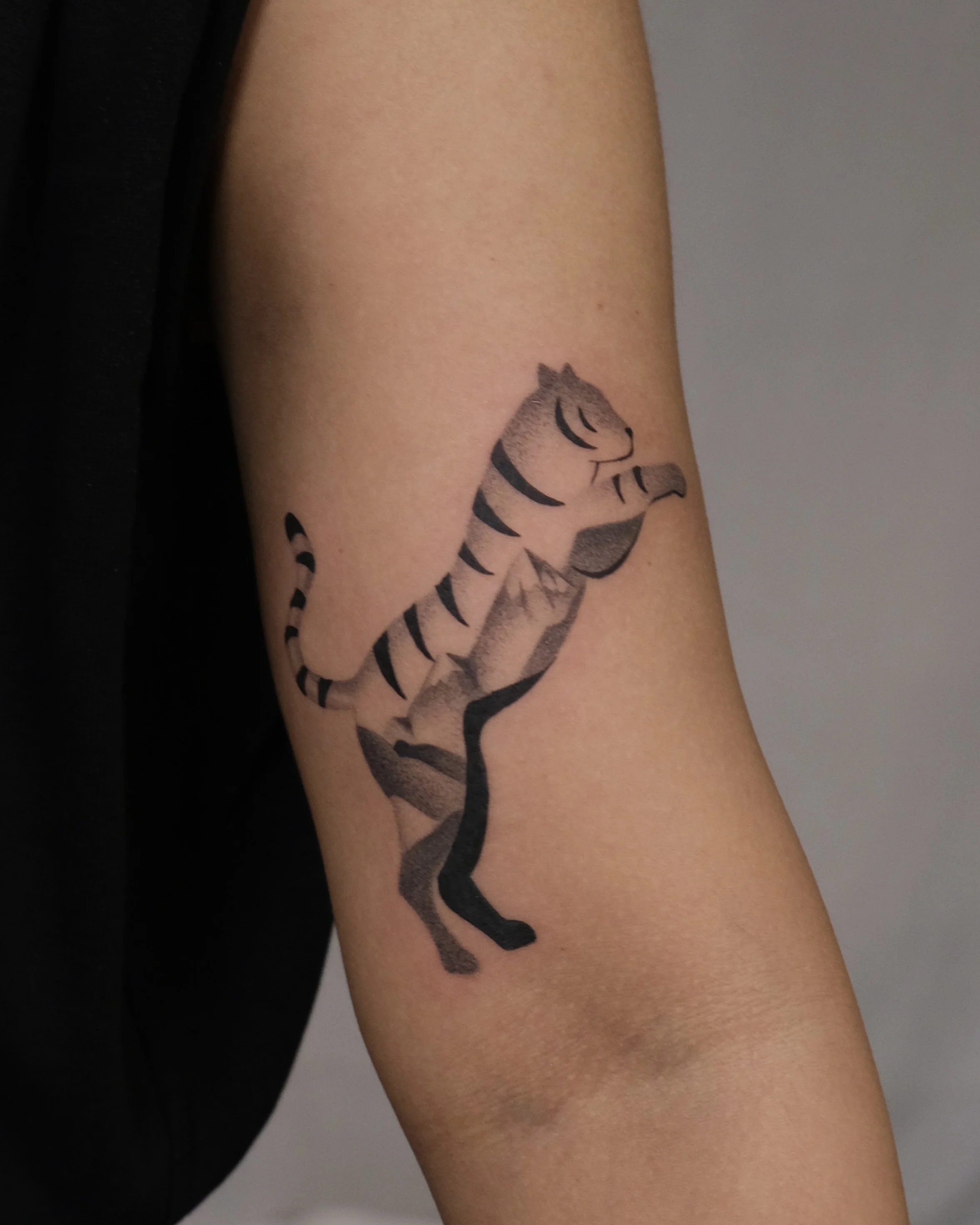 surreal tiger tattoo by new york tattoo artist ginseng ink.