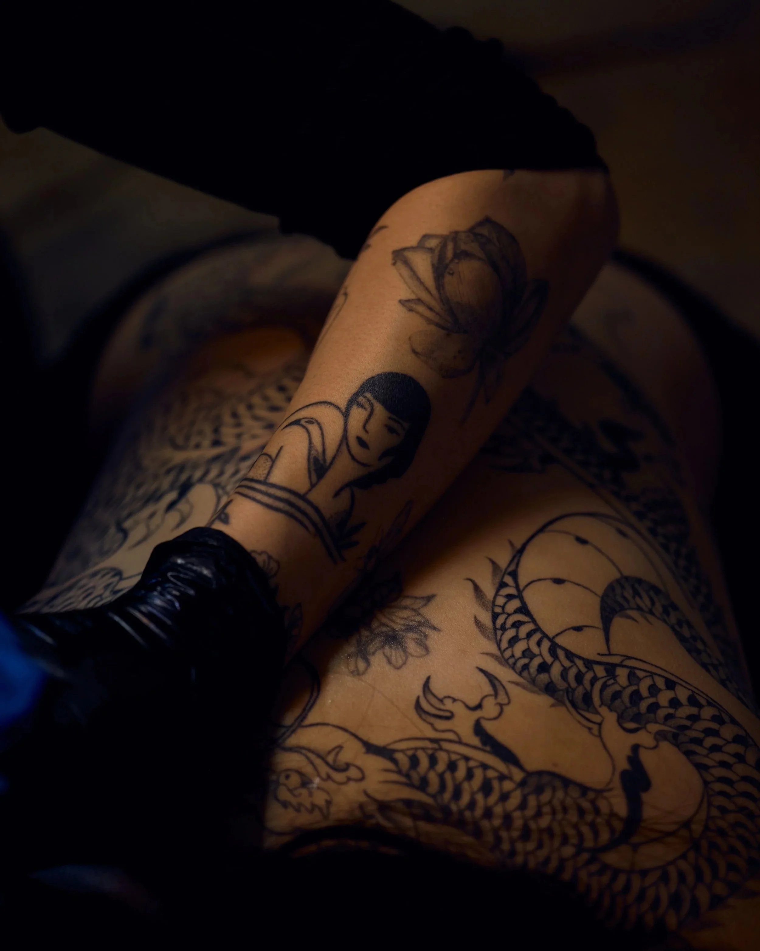 Photo of a back tattoo closeup by Taurat Hossain