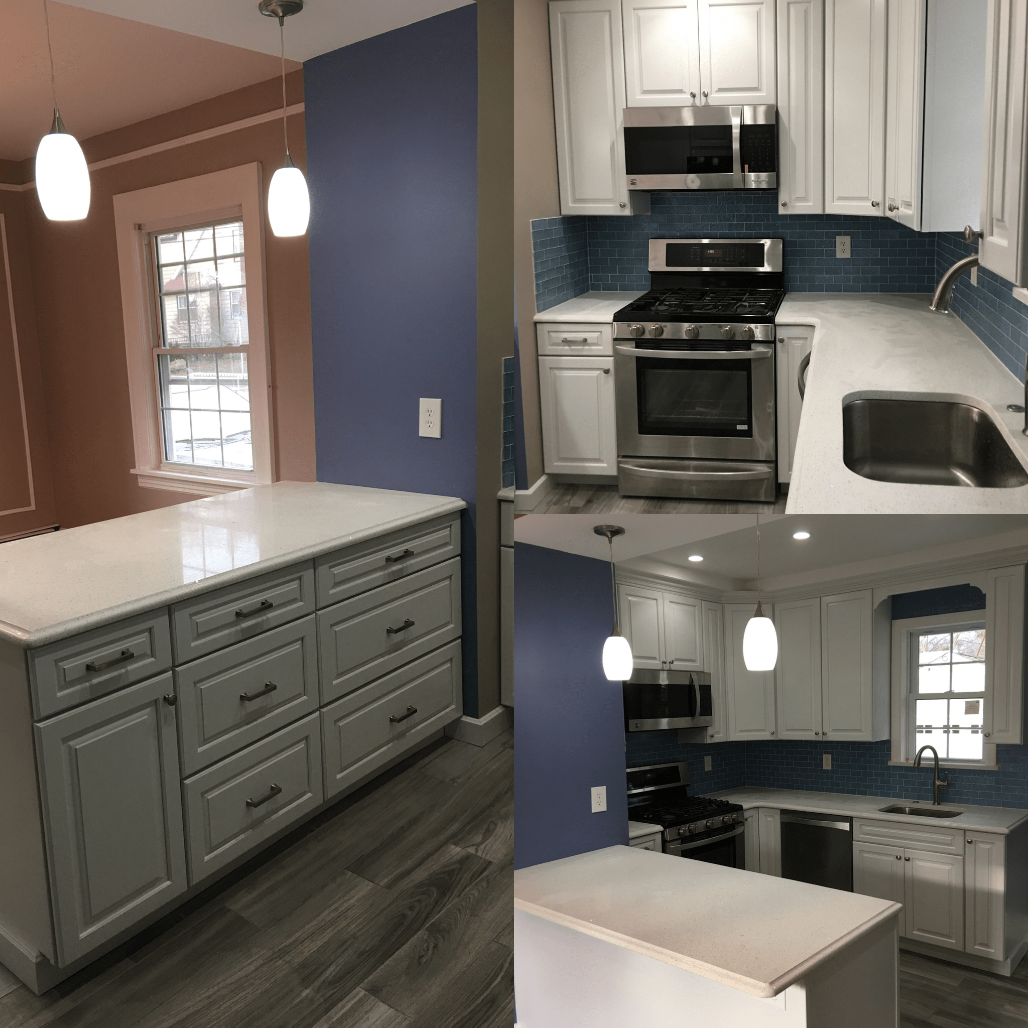 A kitchen with white cabinets, stainless steel appliances, dark blue backsplash tiles, and white countertops. There is a gas stove, a microwave, an undermount sink, and pendant lights hanging from the ceiling. The kitchen opens into a dining or living area with large windows and a blue accent wall.