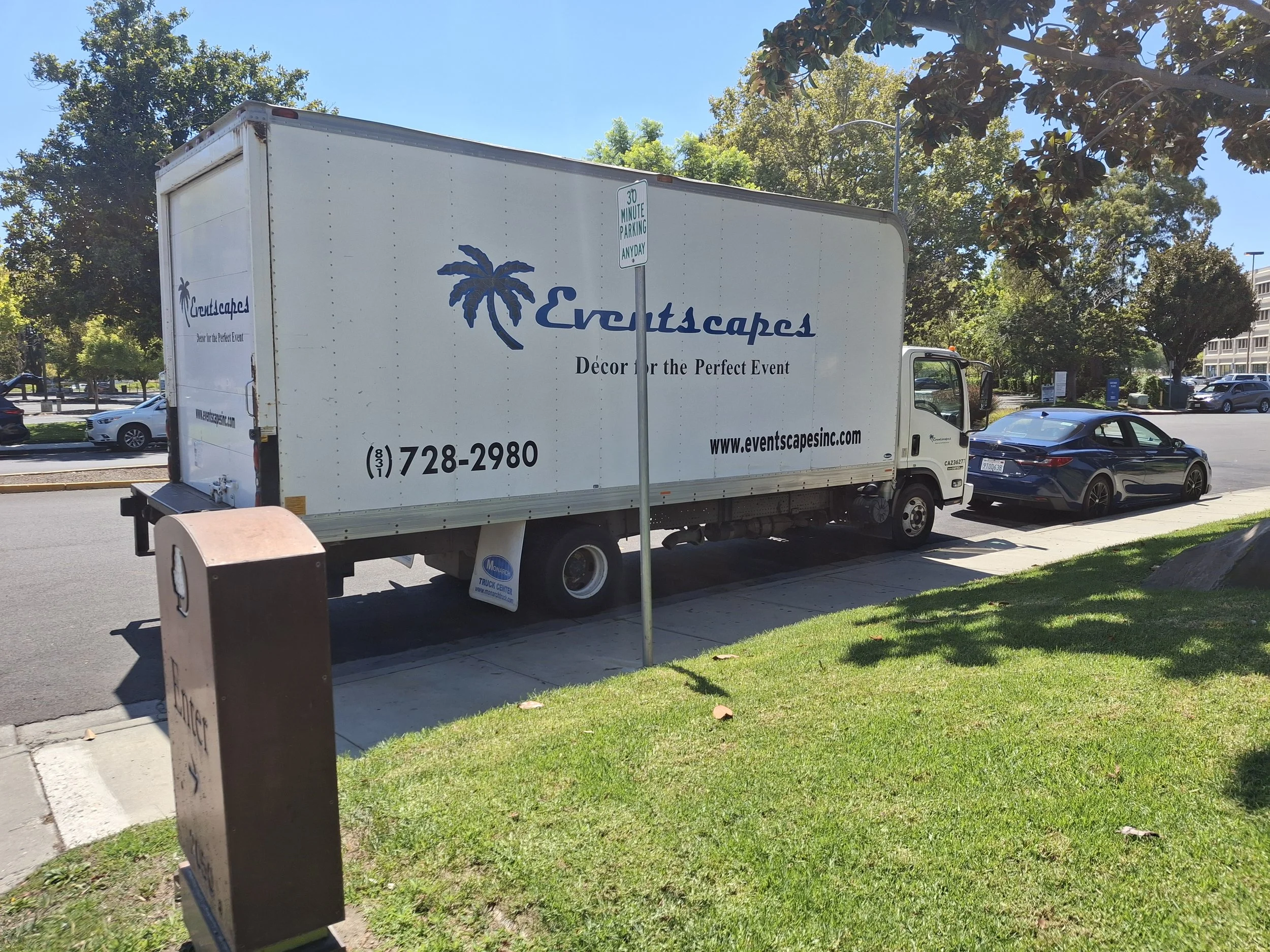 Original 20-foot Isuzu NPR commercial box truck before its transformation into an off-grid mobile storytelling studio and DIY stealth RV for The Two Miracles Project.