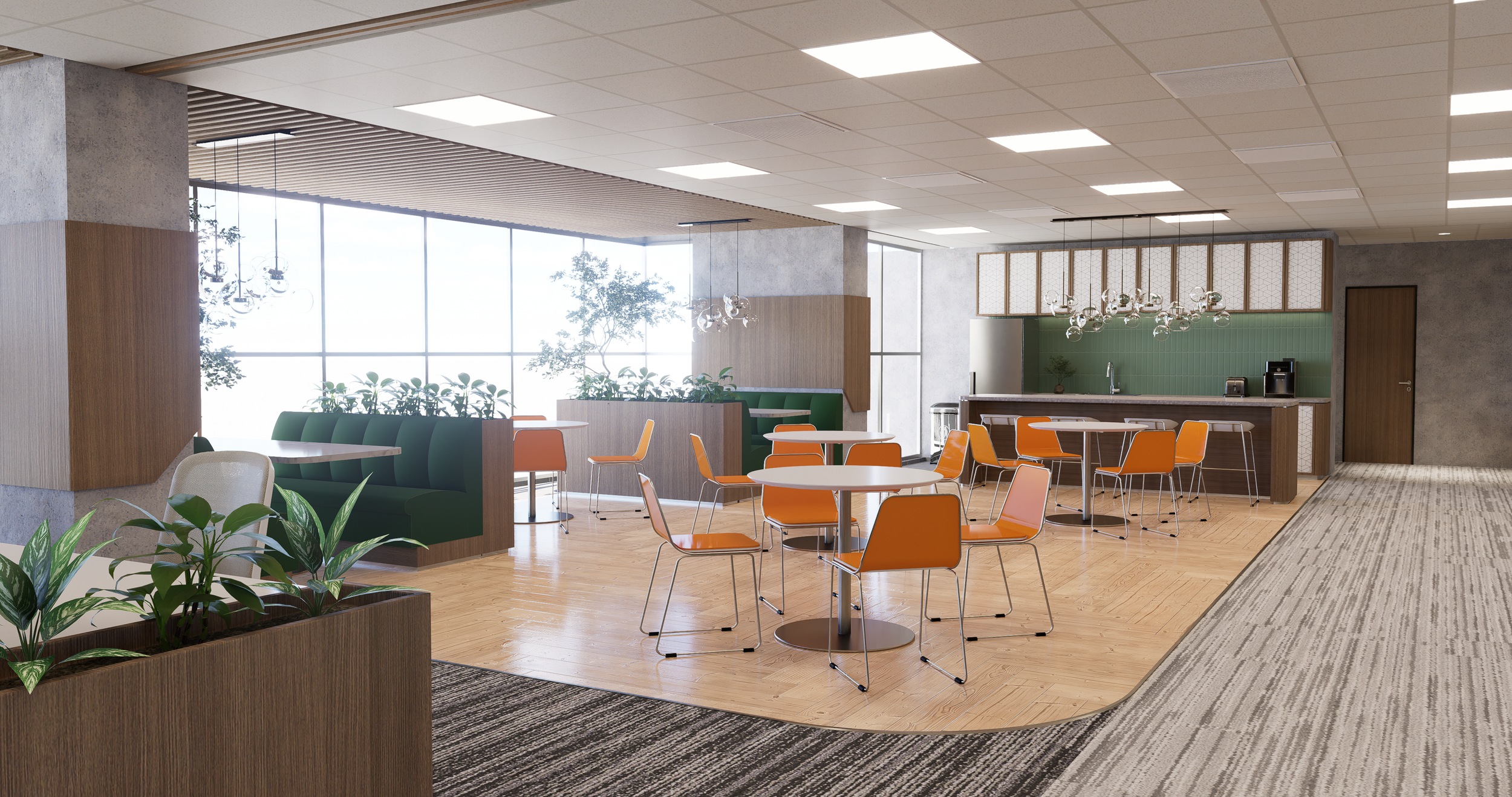 Modern office breakroom with orange chairs, round tables, green booths, and ceiling lights. The space includes a kitchenette with appliances and potted plants for decoration.