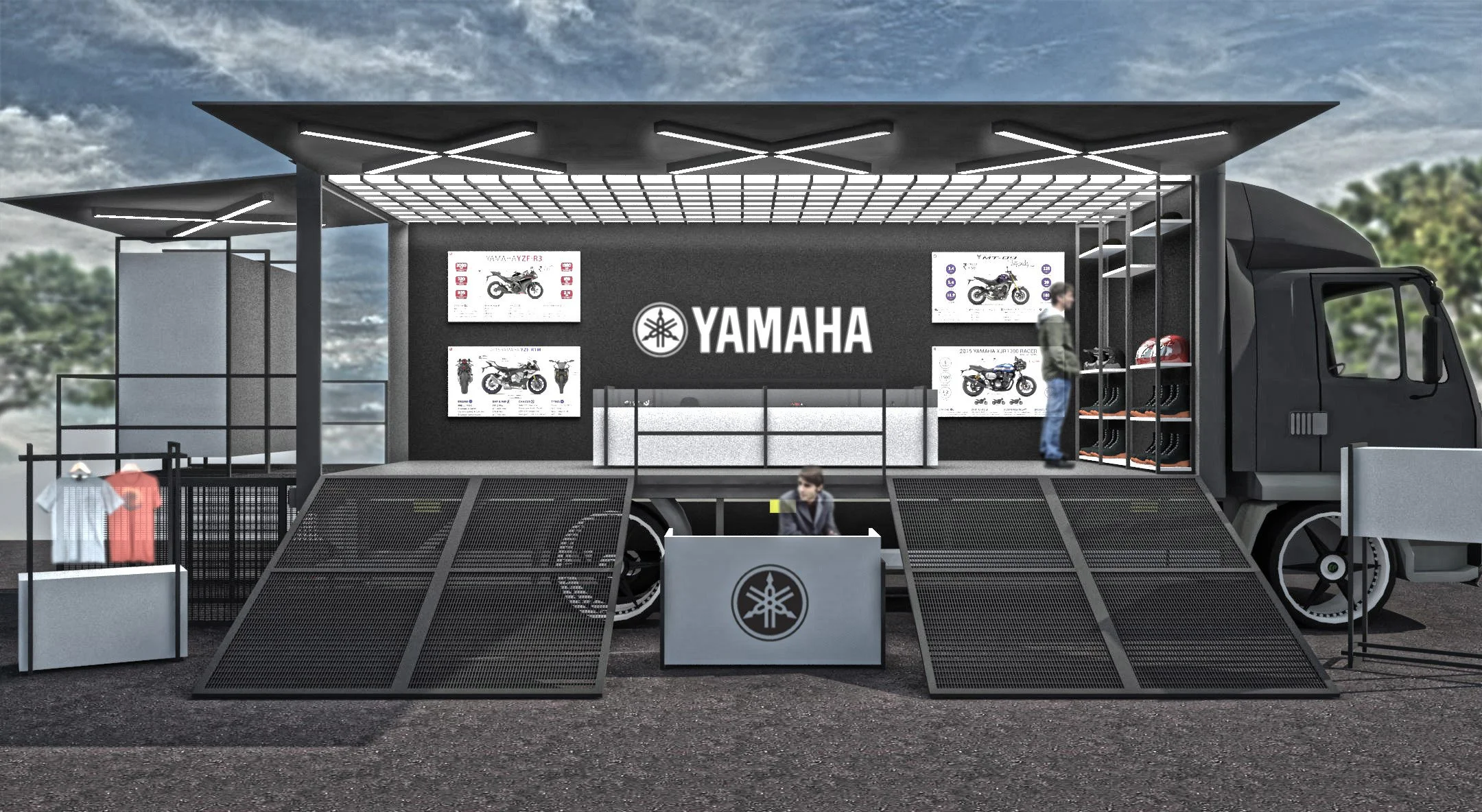 Yamaha promotional truck with motorcycle displays, branded signage, and merchandise racks.